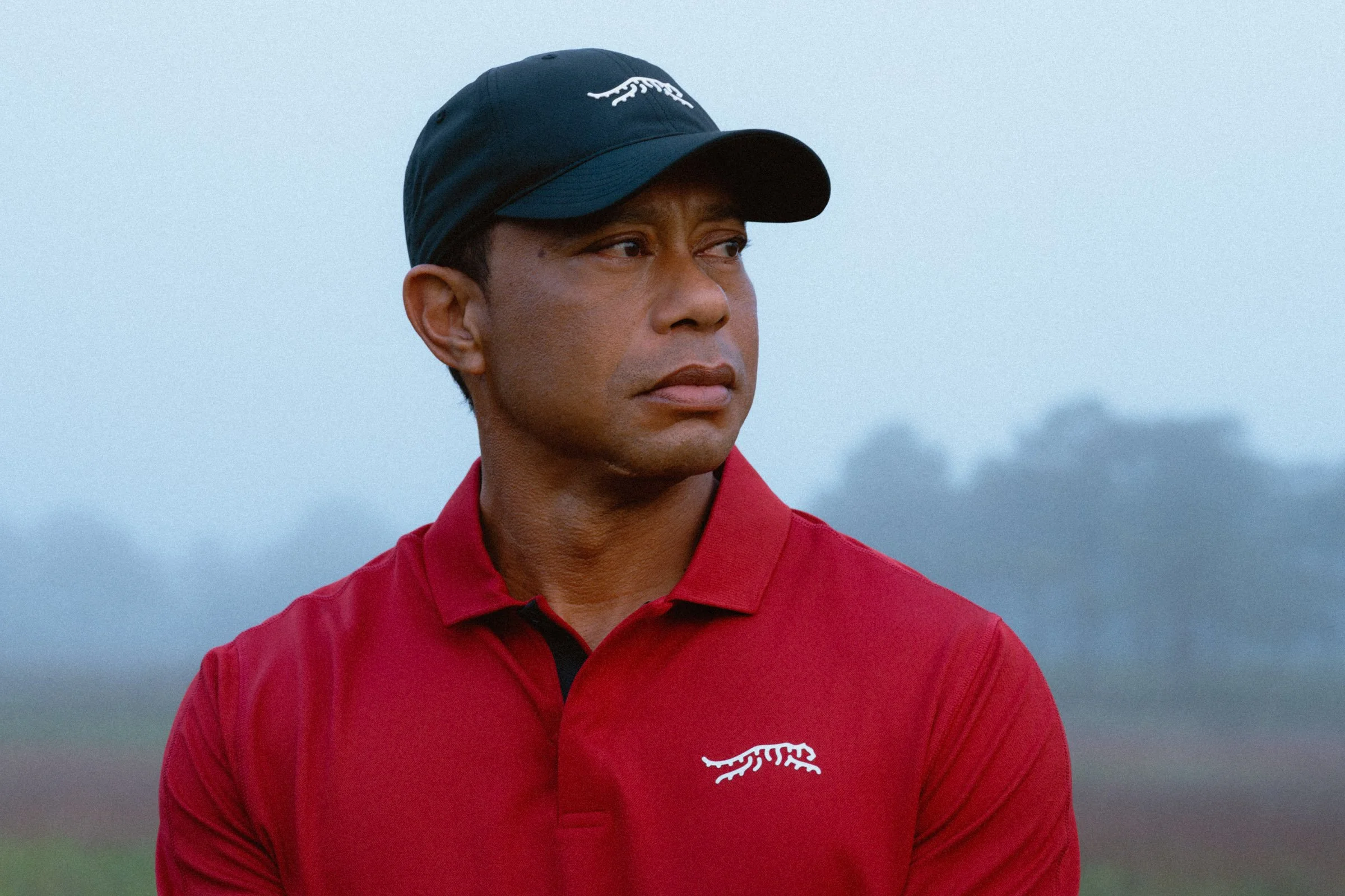 Tiger Woods portrait photographed for a premium golf apparel brand, Sun Day Red, advertising campaign by Los Angeles commercial photographer Garrett Byrum. Golf advertising photographer.