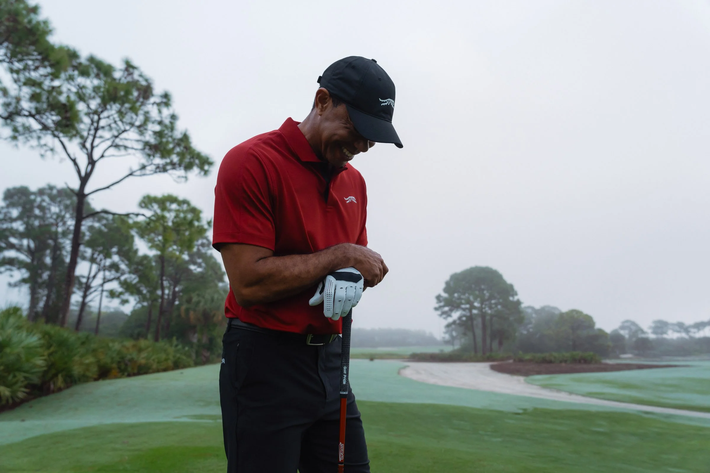 Tiger Woods photographed for a premium golf apparel brand, Sun Day Red, advertising campaign by Los Angeles commercial photographer Garrett Byrum. Golf advertising photographer.