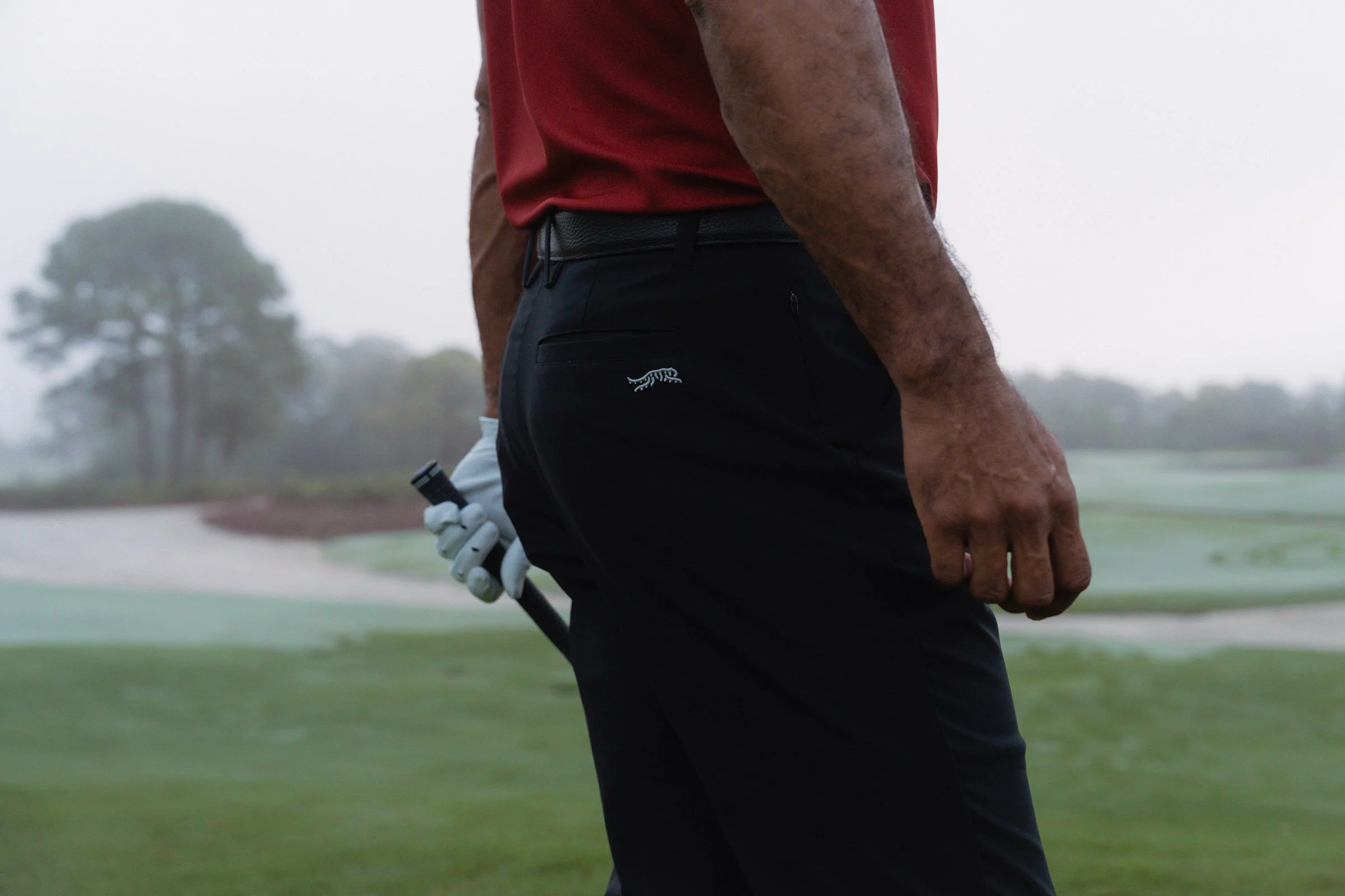 Tiger Woods photographed for a premium golf apparel brand, Sun Day Red, advertising campaign by Los Angeles commercial photographer Garrett Byrum. Golf advertising photographer.