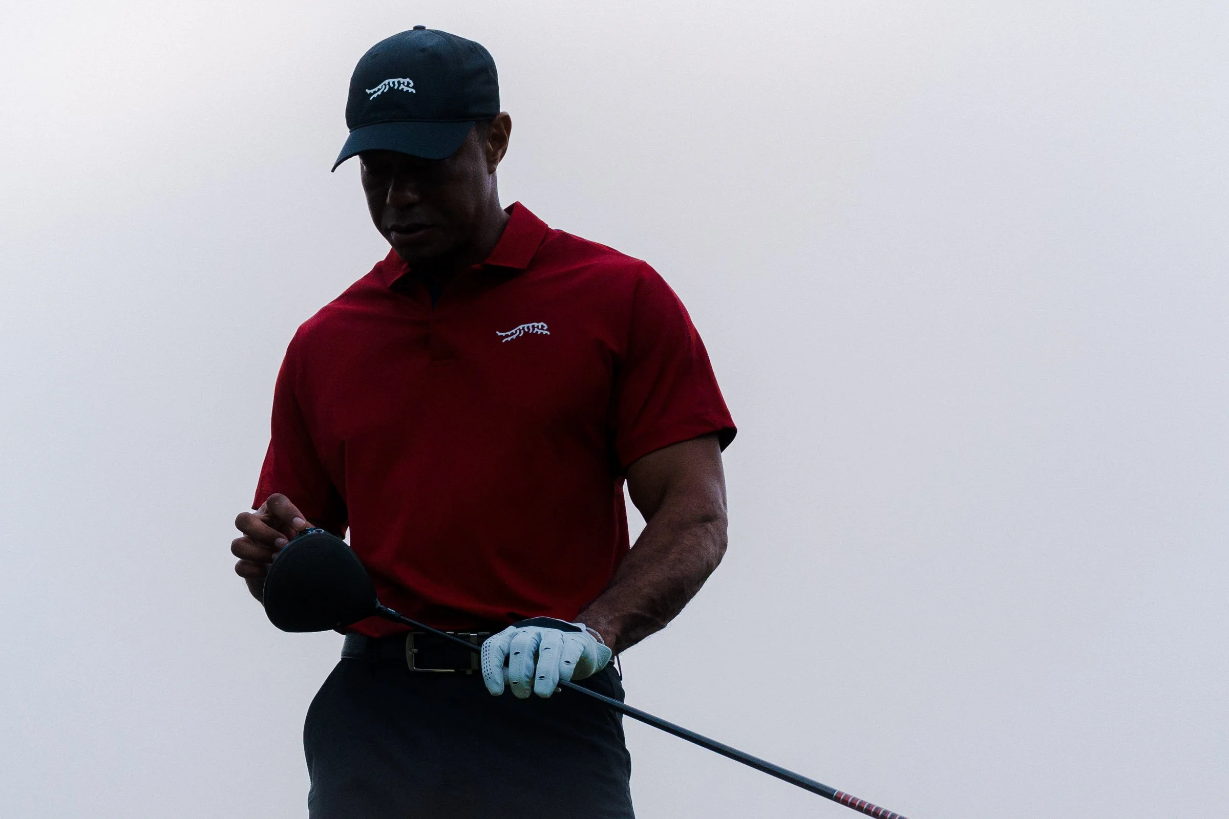 Tiger Woods photographed for a premium golf apparel brand, Sun Day Red, advertising campaign by Los Angeles commercial photographer Garrett Byrum. Golf advertising photographer.