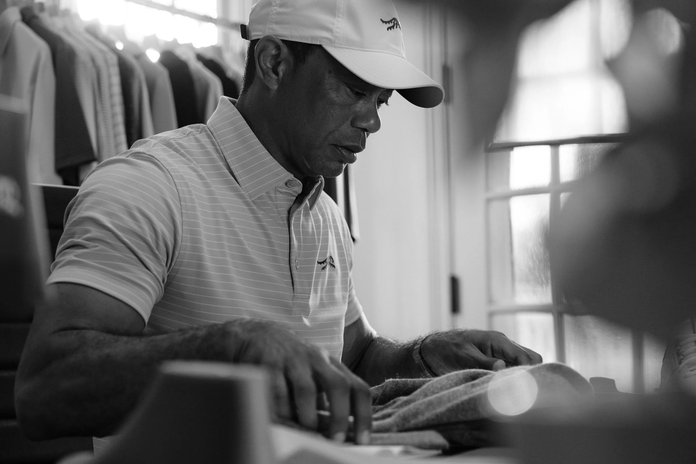 Tiger Woods portrait photographed for a premium golf apparel brand, Sun Day Red, advertising campaign by Los Angeles commercial photographer Garrett Byrum. Golf advertising photographer.