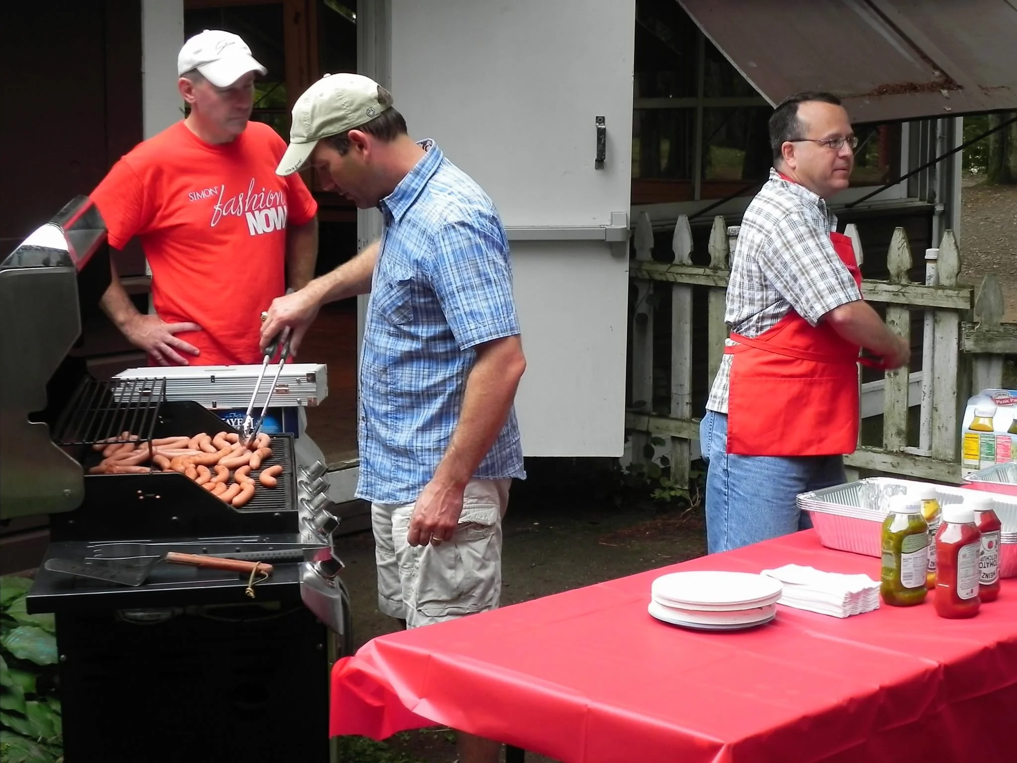 Selectmen serve hotdogs.jpg