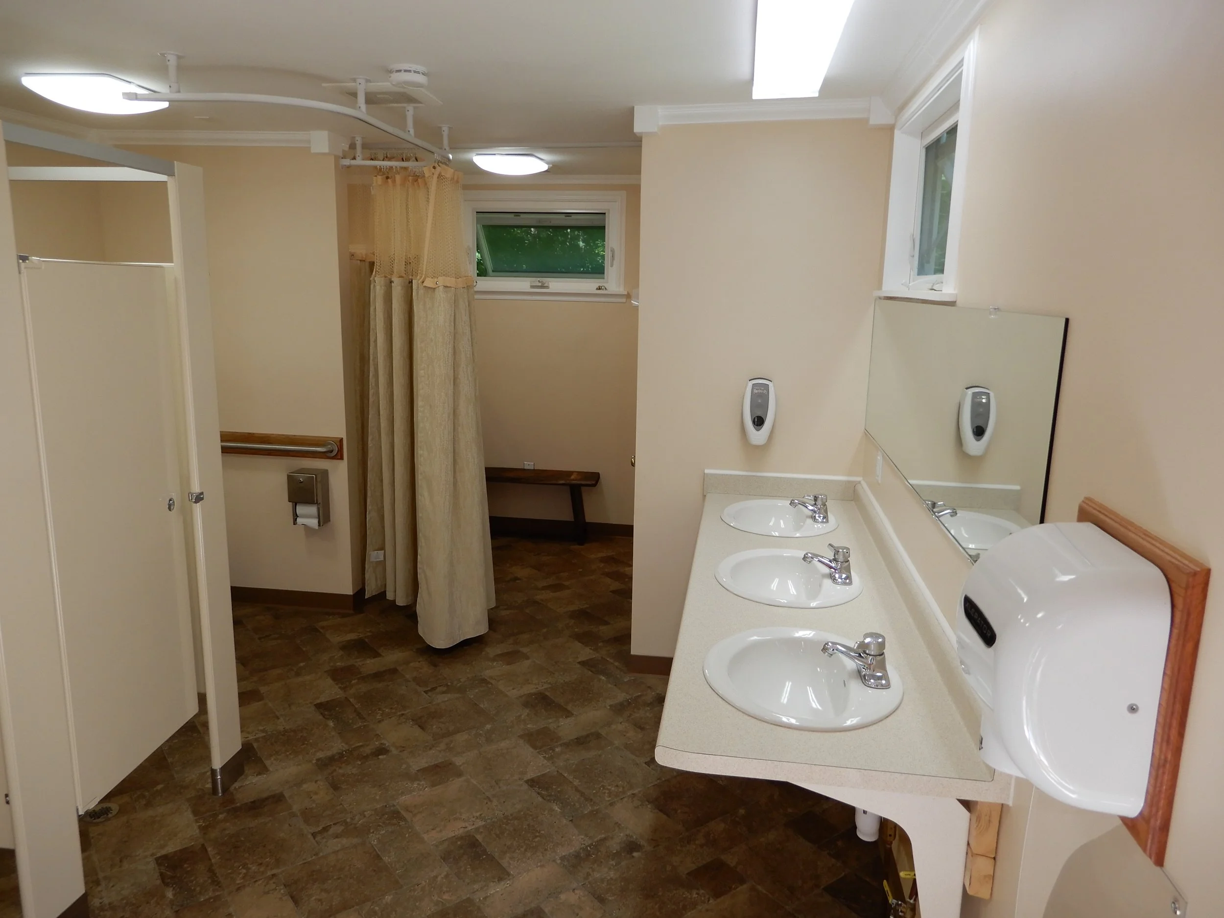 Modern bathhouse in cabin area