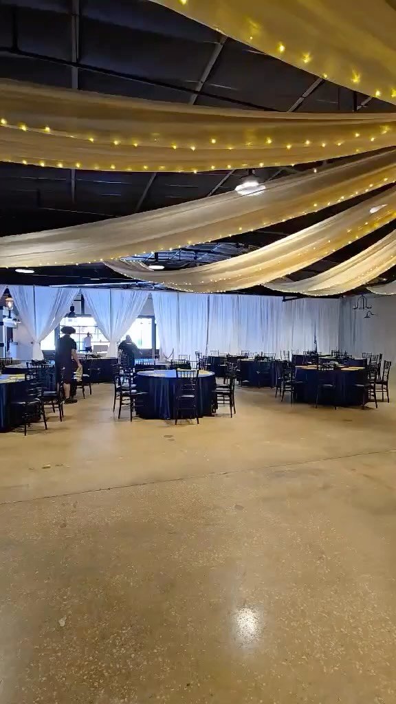 Beautiful wedding at Venue 650. We provided the Draped Ceiling “Starburst” with String Lights, Draped Backdrop, Grace Chairs (Gold Vintage Chairs), Gold Wire Placemats, Custom Monogram Gobo, & various other rentals. Pleasure working w