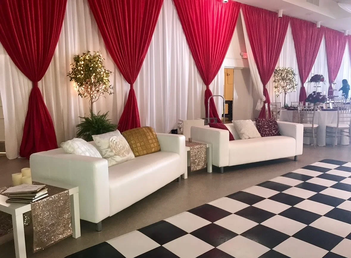 Wall Draping with a 2md layer of Draped Red Swags at the Tampa Garden Club. ————————————————————————&mdash