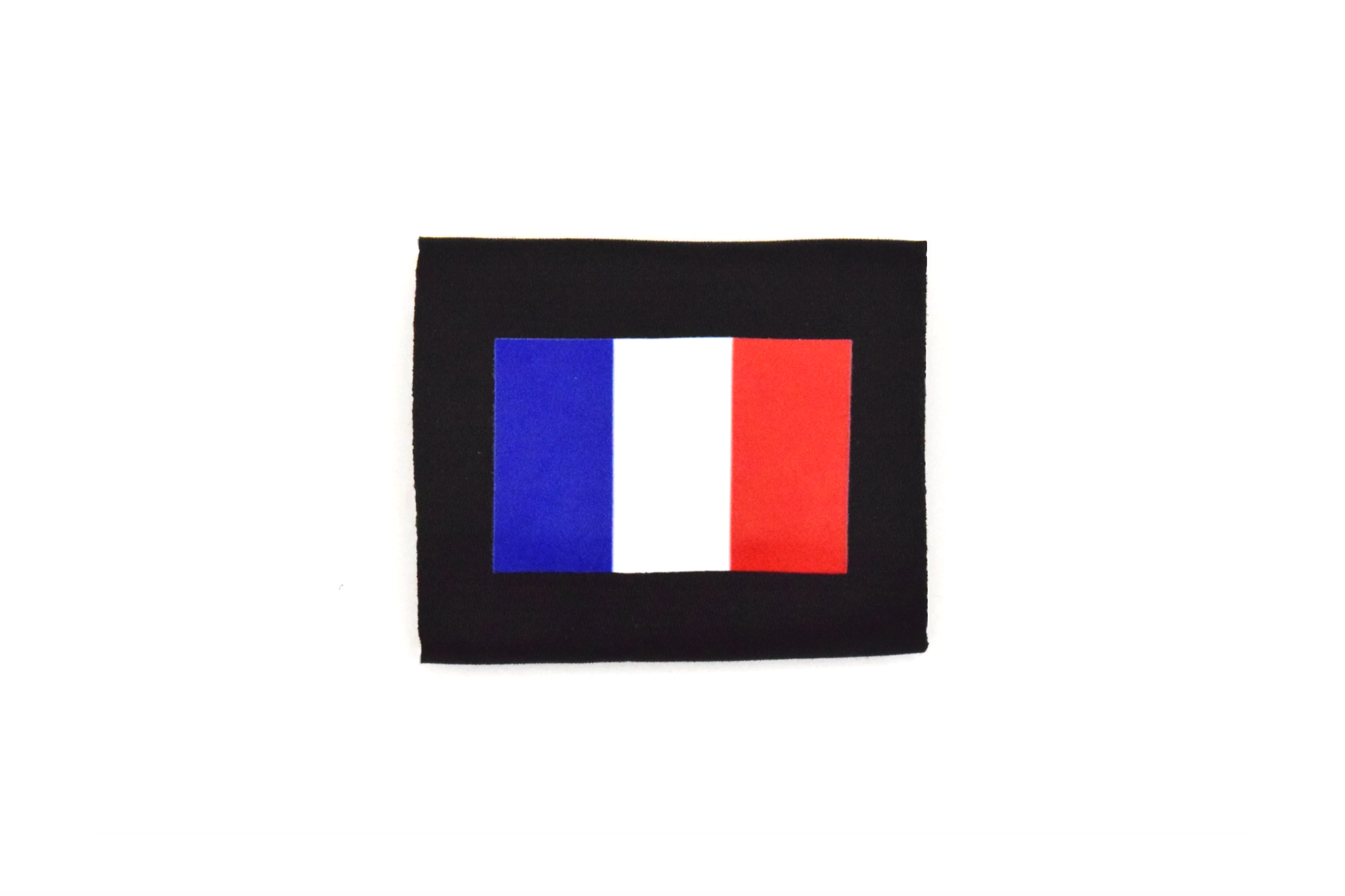 Black square with a small French flag consisting of blue, white, and red vertical stripes in the center.
