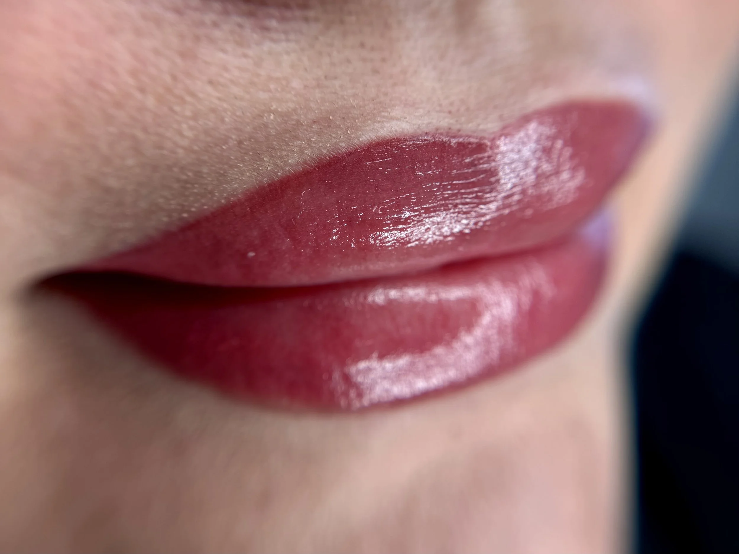 Lips tattoo with berry color pigment