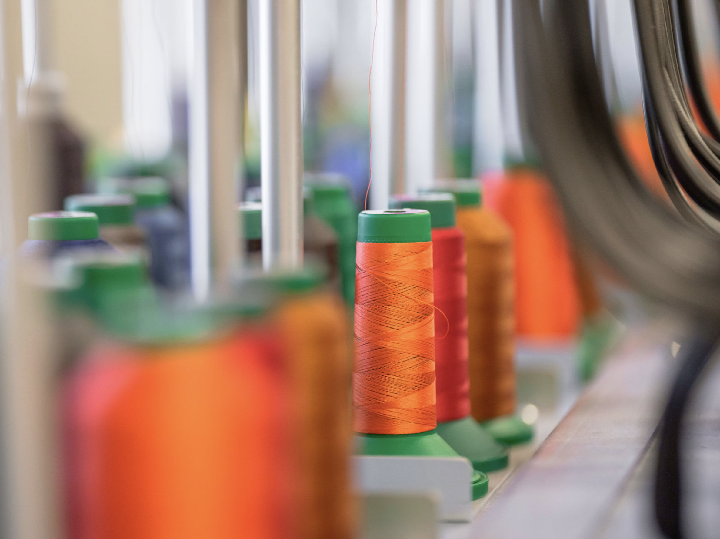 Bright embroidery thread spools arranged for high-quality stitching.