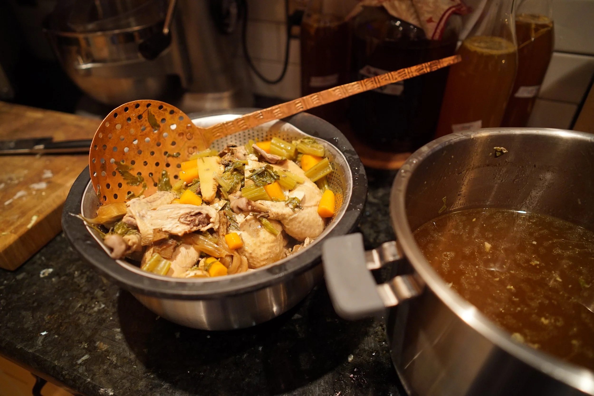 After cooking, I strain the solids from the broth