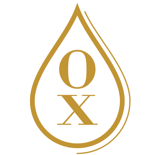 Ein goldfarbenes Logo mit einem Wassertropfen, darin das OX-Logo in goldfarbenen Buchstaben.