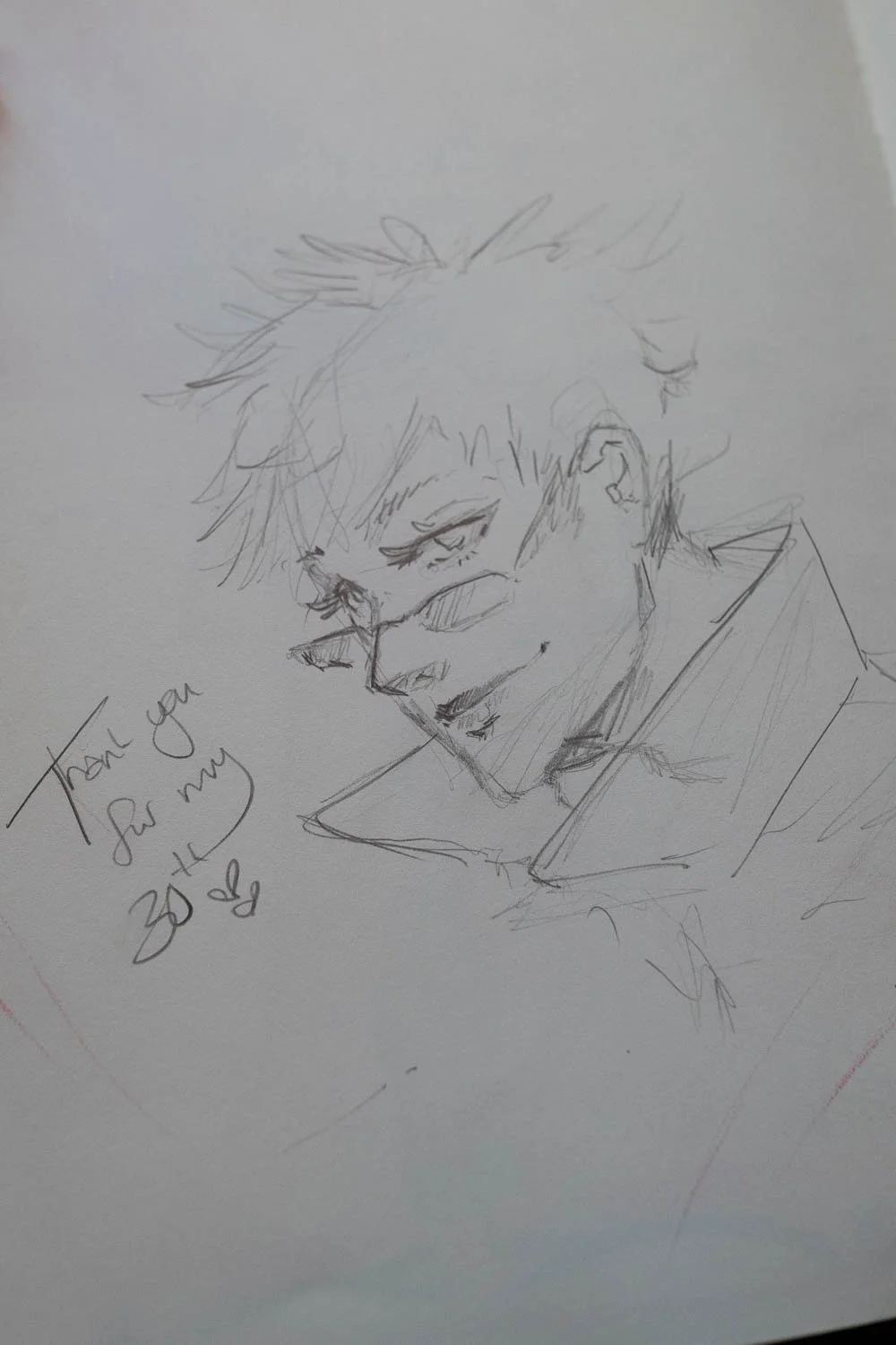 Foto einer Seite aus dem Liquid Diary Tagebuch, in dem ein Gast etwas gezeichnet oder sich mit einer Nachricht verewigt hat.