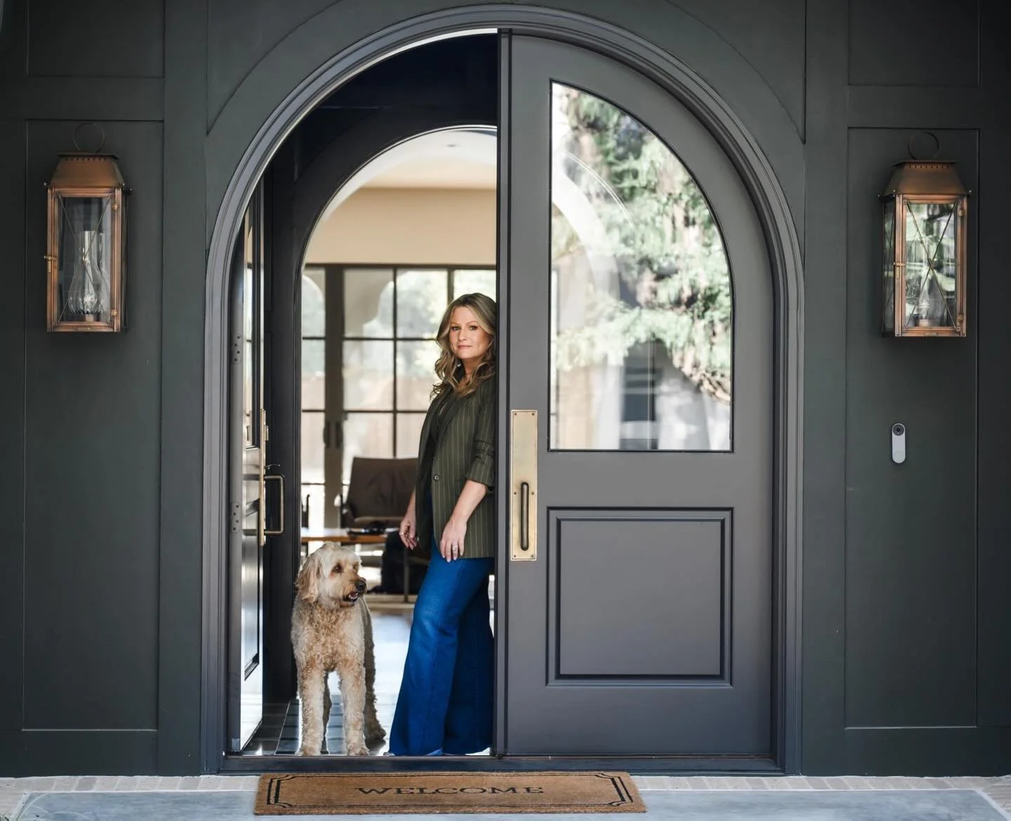 The arched doors. Rupert, the golden doodle. The quiet confidence of someone who built this.

This is what brand photography looks like when we stop trying to make everything look perfect and start making it look true.

For this interior design sessi