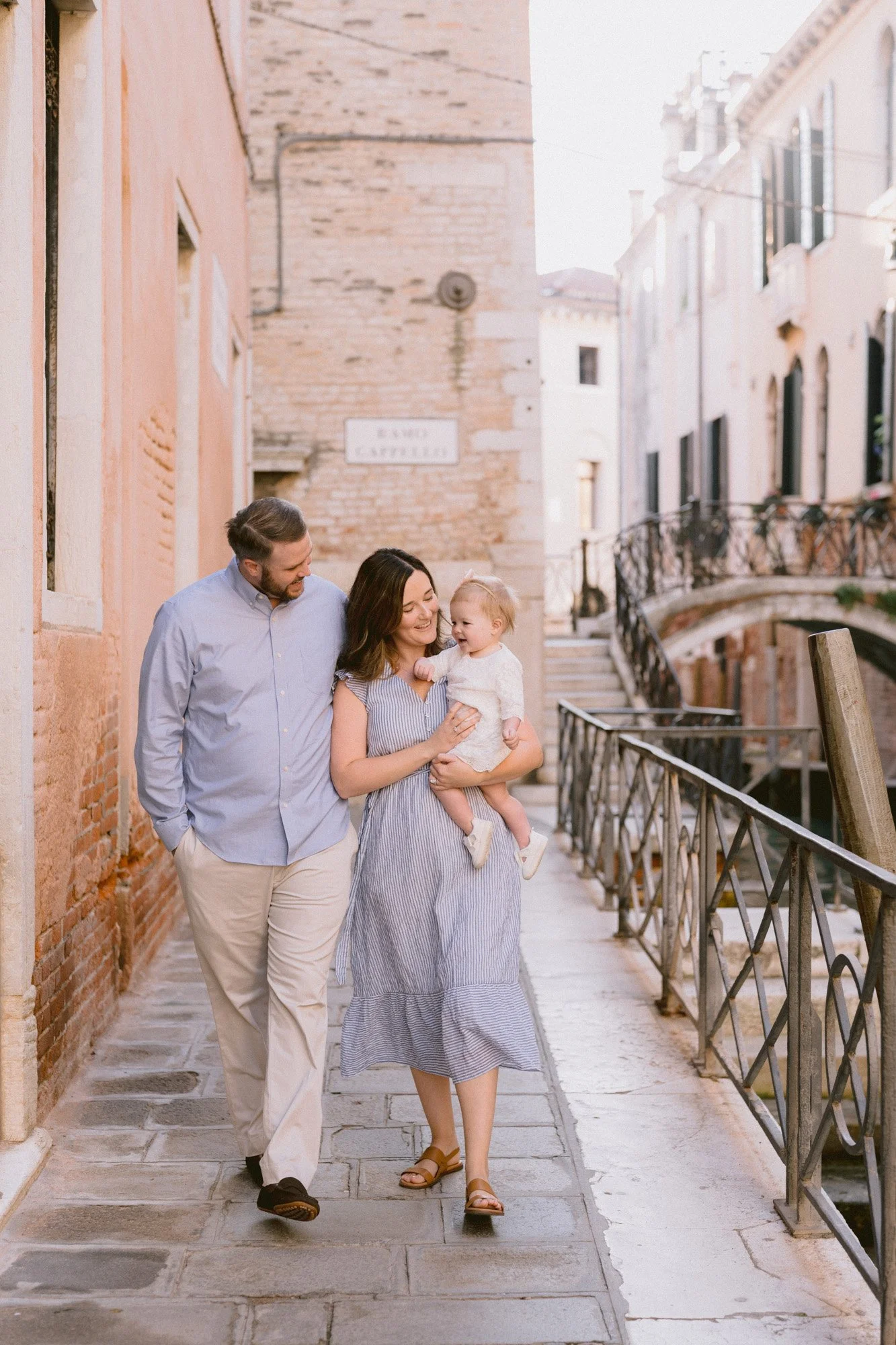 Family walking through Venice alleys