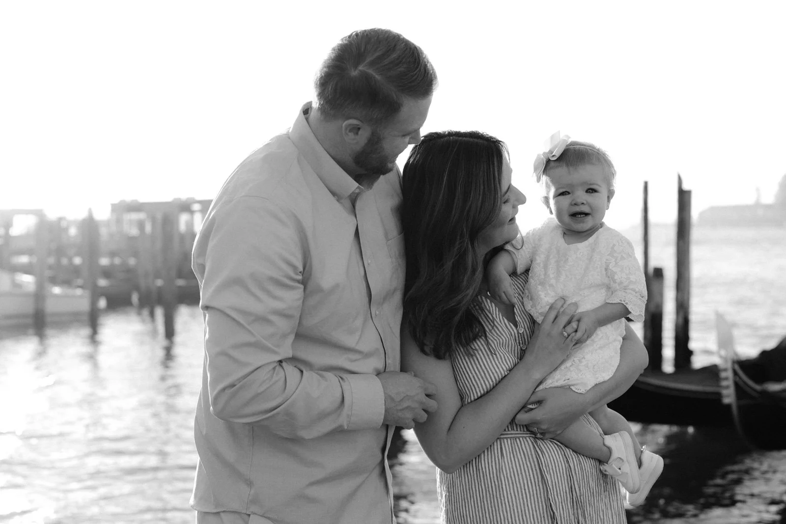Black and white family moment in Venice