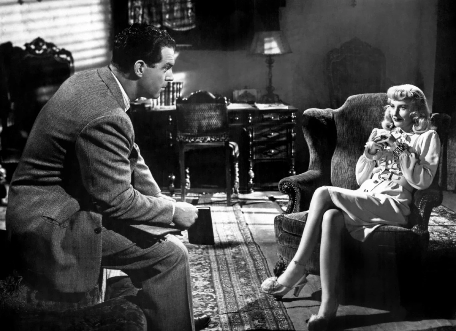 Walter Neff plotting with Phyllis Dietrichson in Double Indemnity