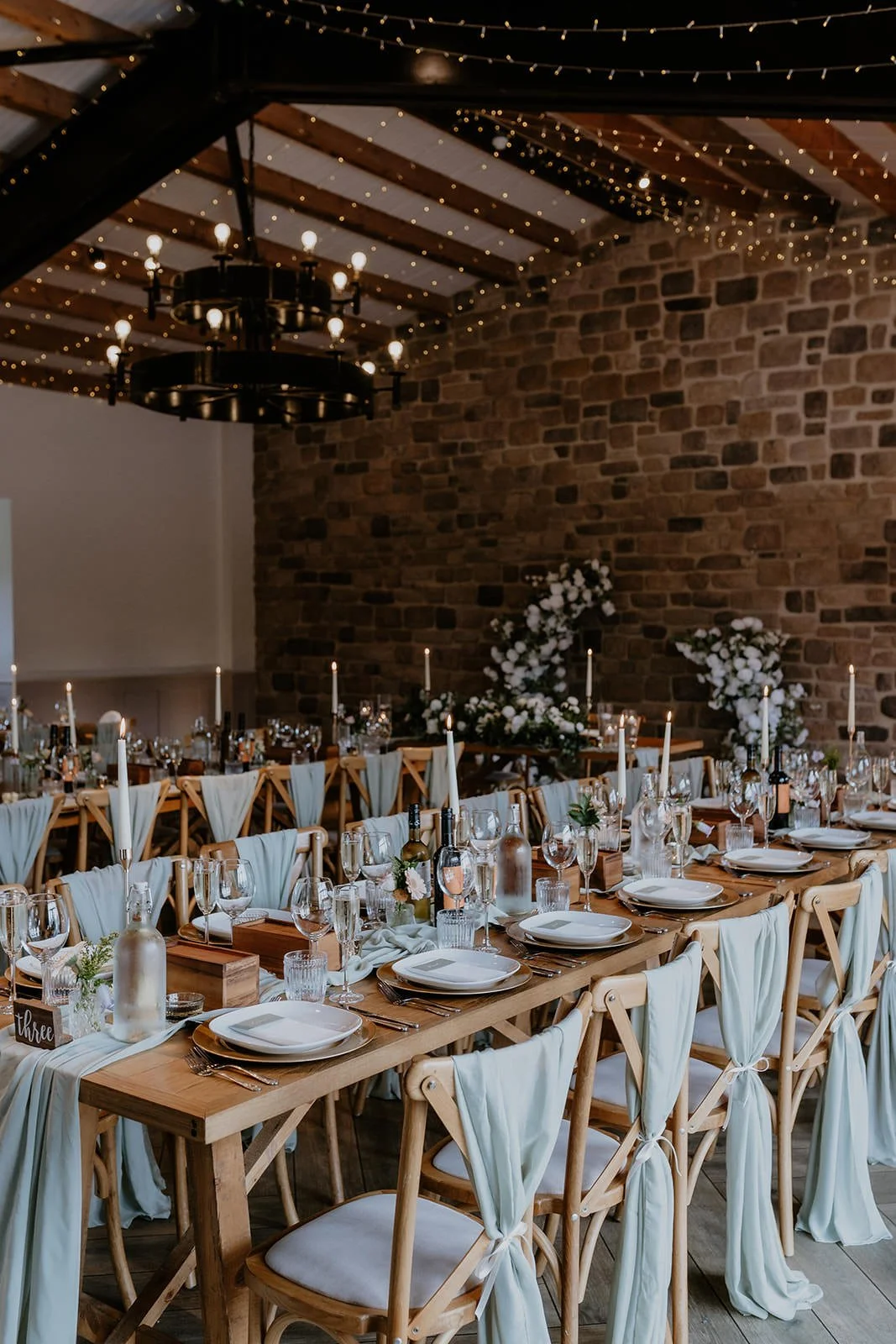 Luxury Wedding Styling including chair coverings and ribbons.