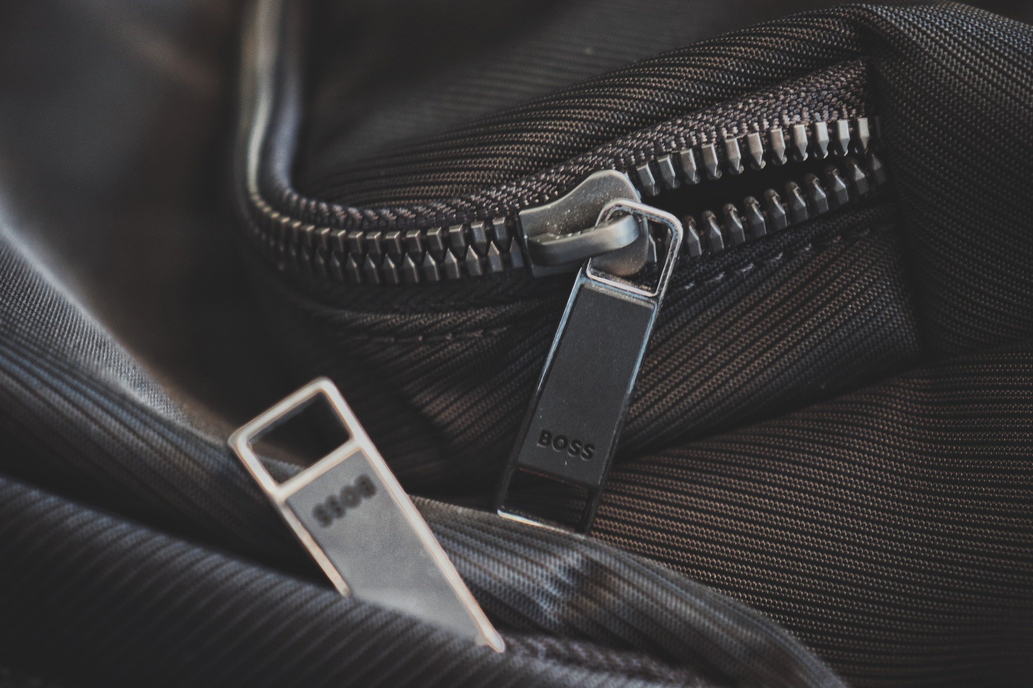 Built for practicality with an edge. This zipped backpack has room for everything you need, wherever you&rsquo;re headed. #MensAccessories #BackpackGoals #TravelInStyle #CarpeDiemMen