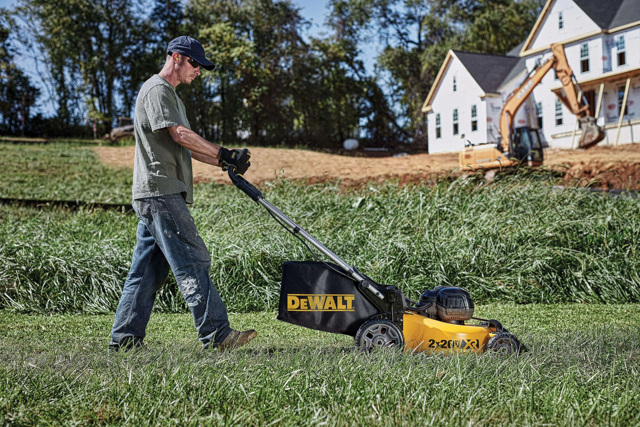 mower-mowing-grass-home-construction-site-01.jpg