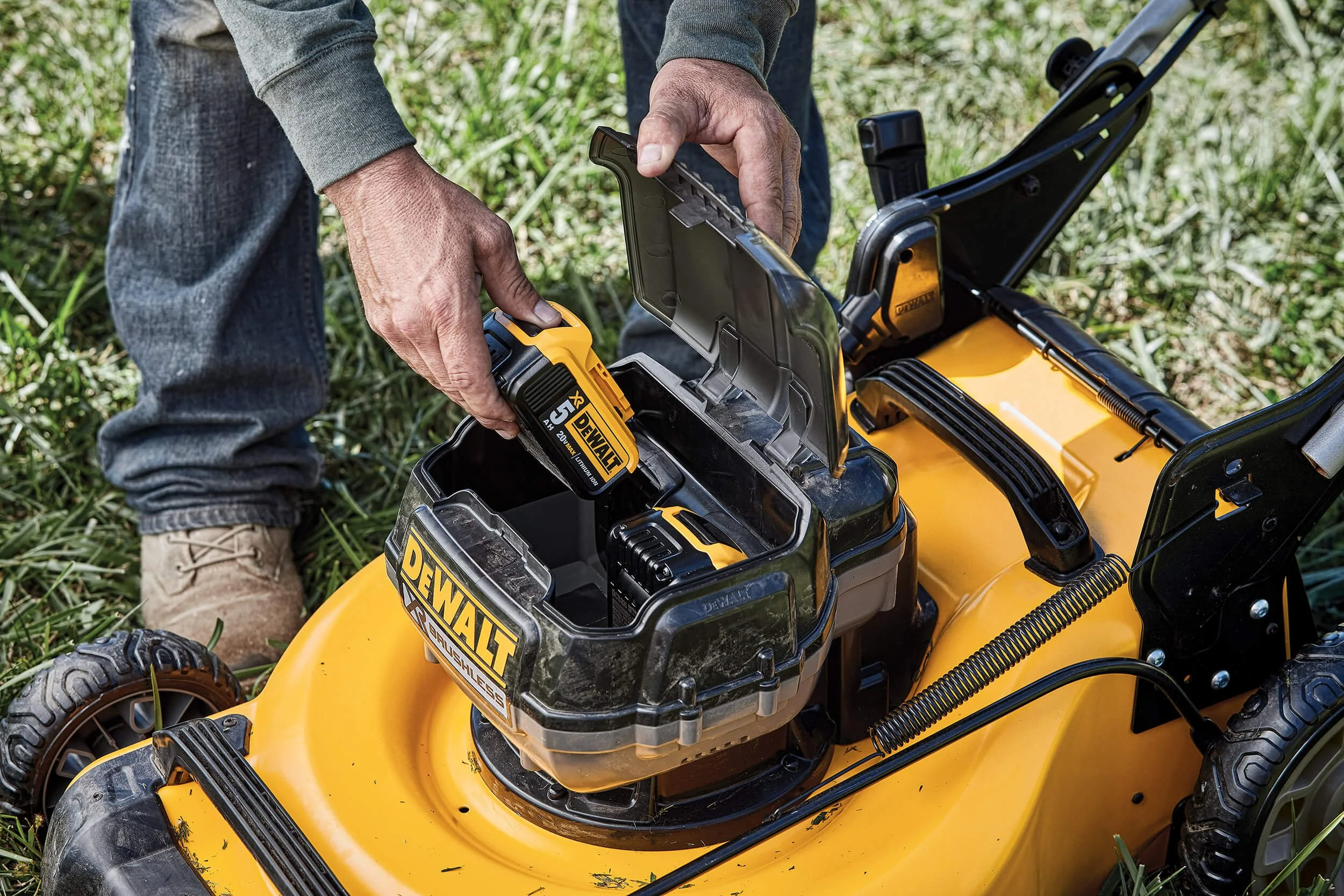 inserting-batteries-cordless-mower.jpg