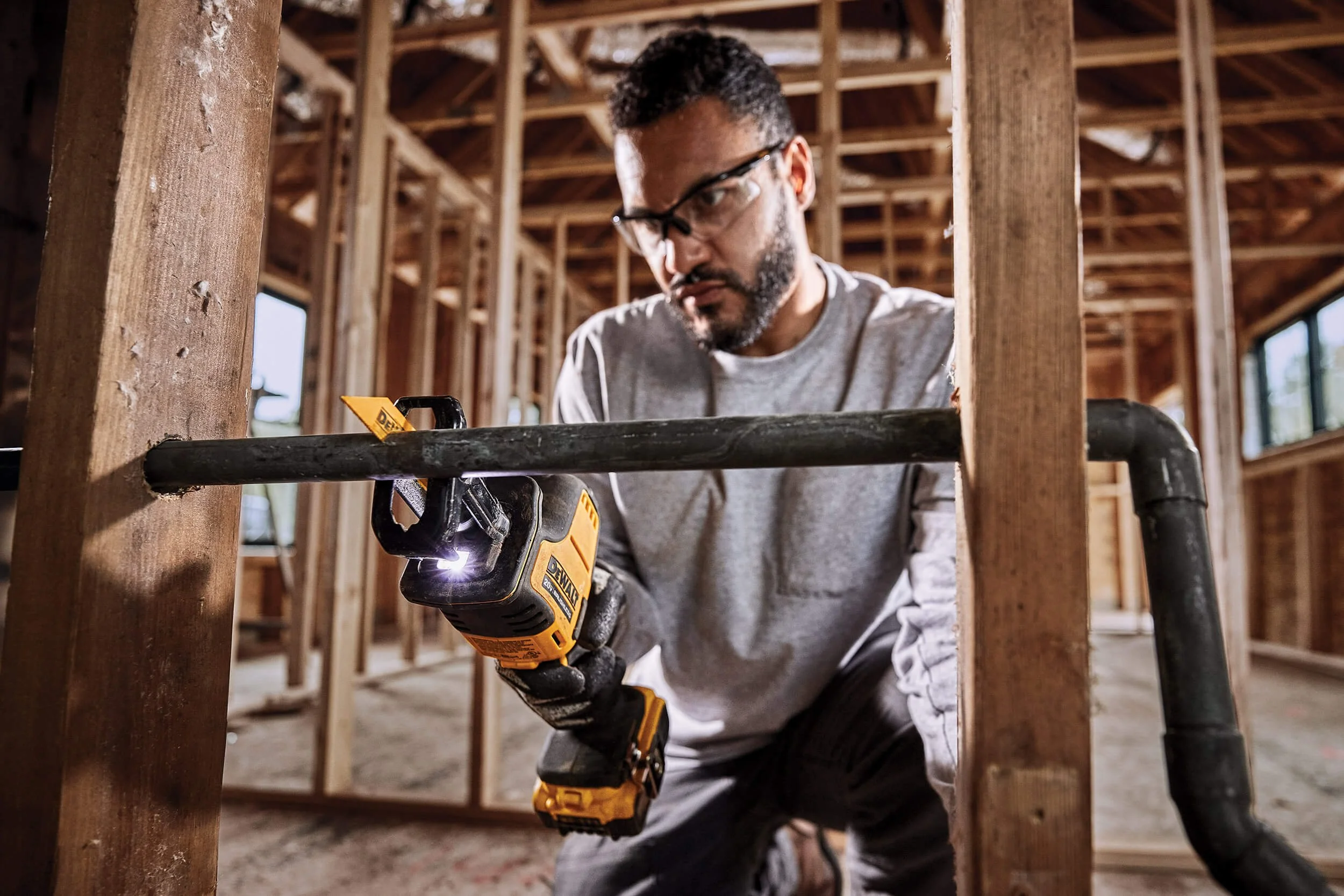 cutting-pipe-in-wall-cordless-saw.jpg