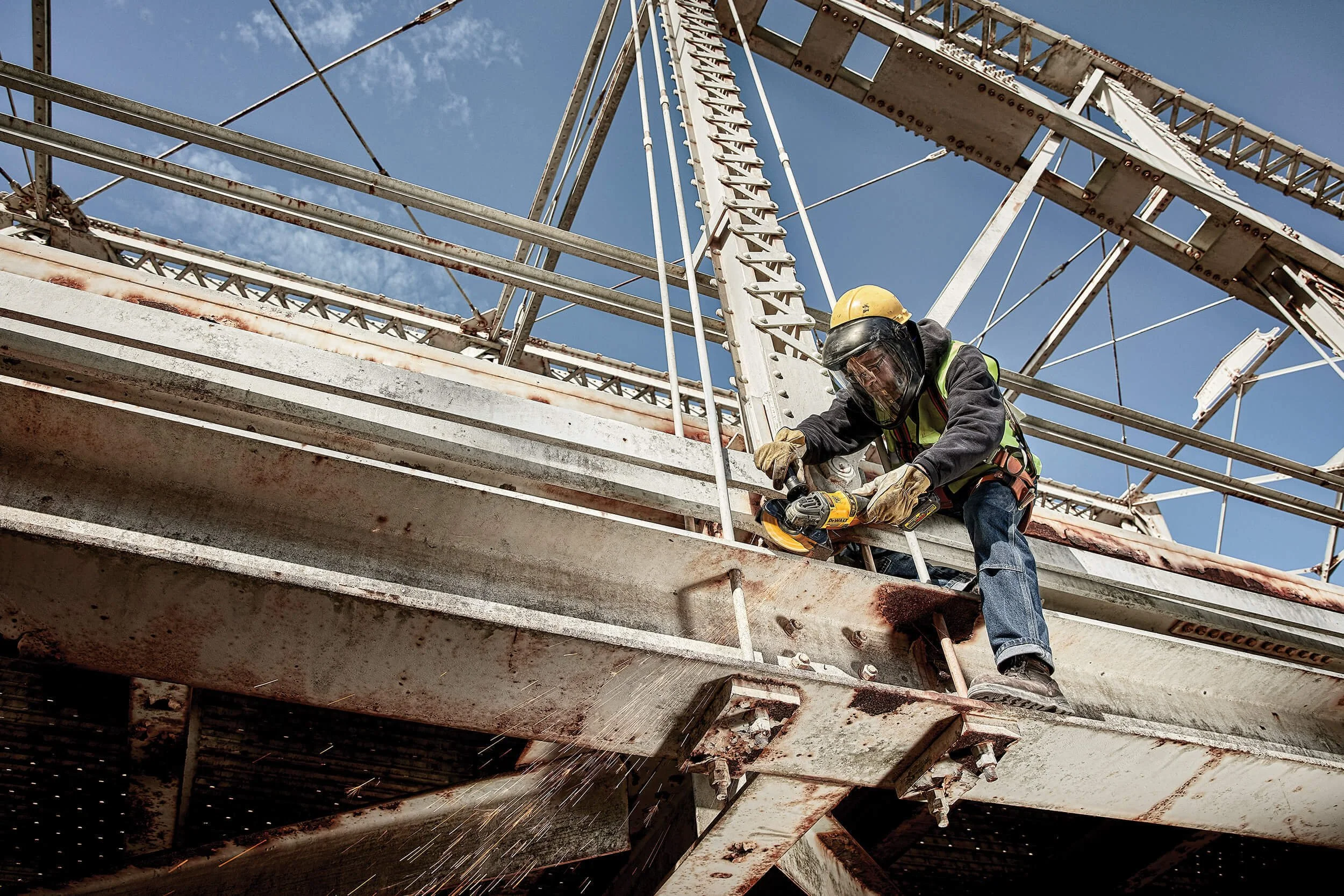 grinder-grinding-sparks-construction-on-bridge.jpg