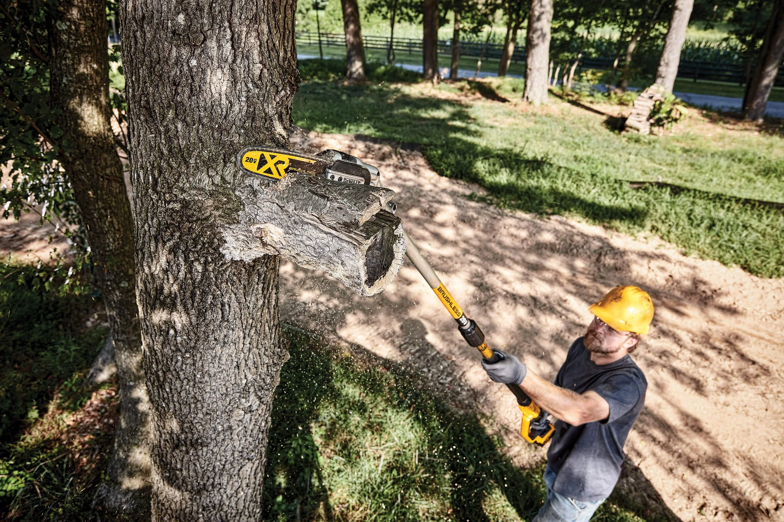 pole-saw-cutting-large-branch.jpg