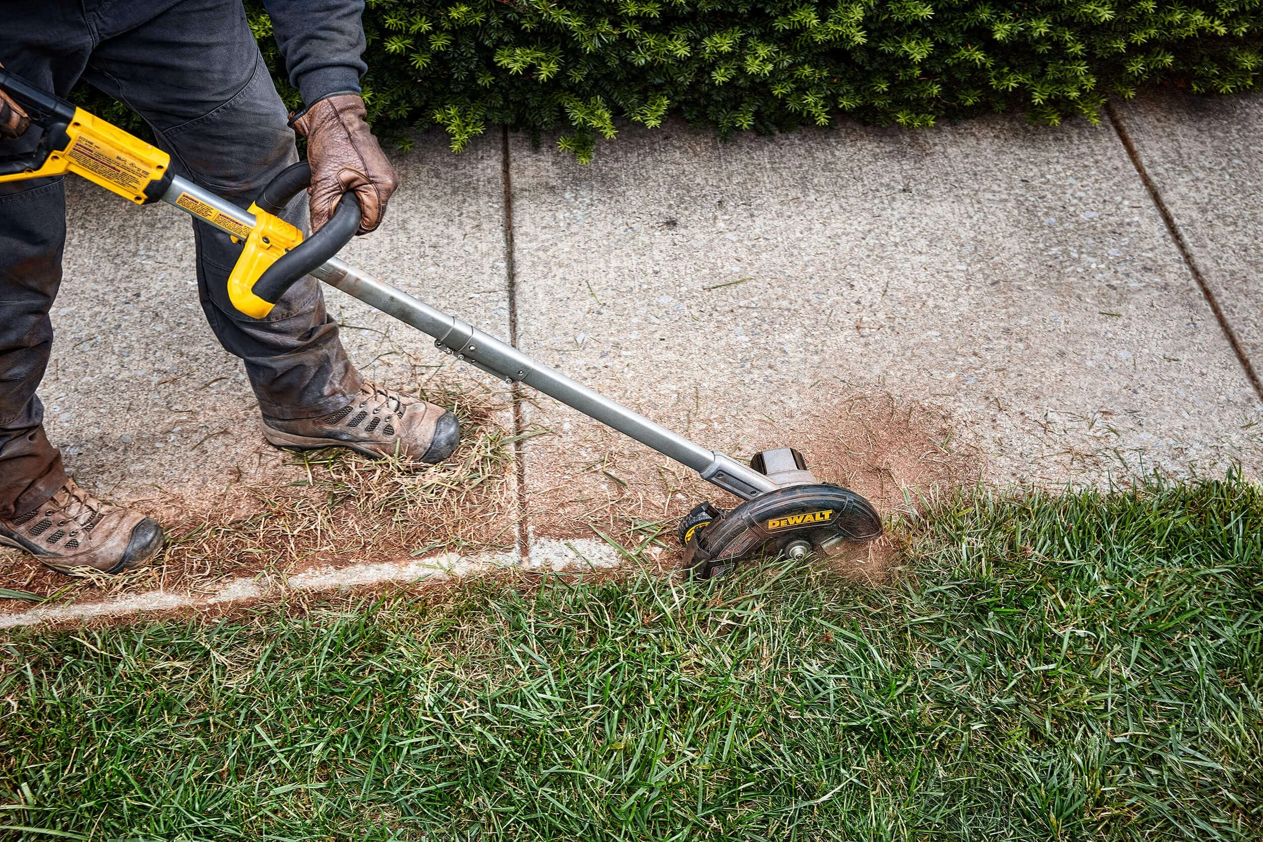 cordless-edger-edging-sidewalk.jpg
