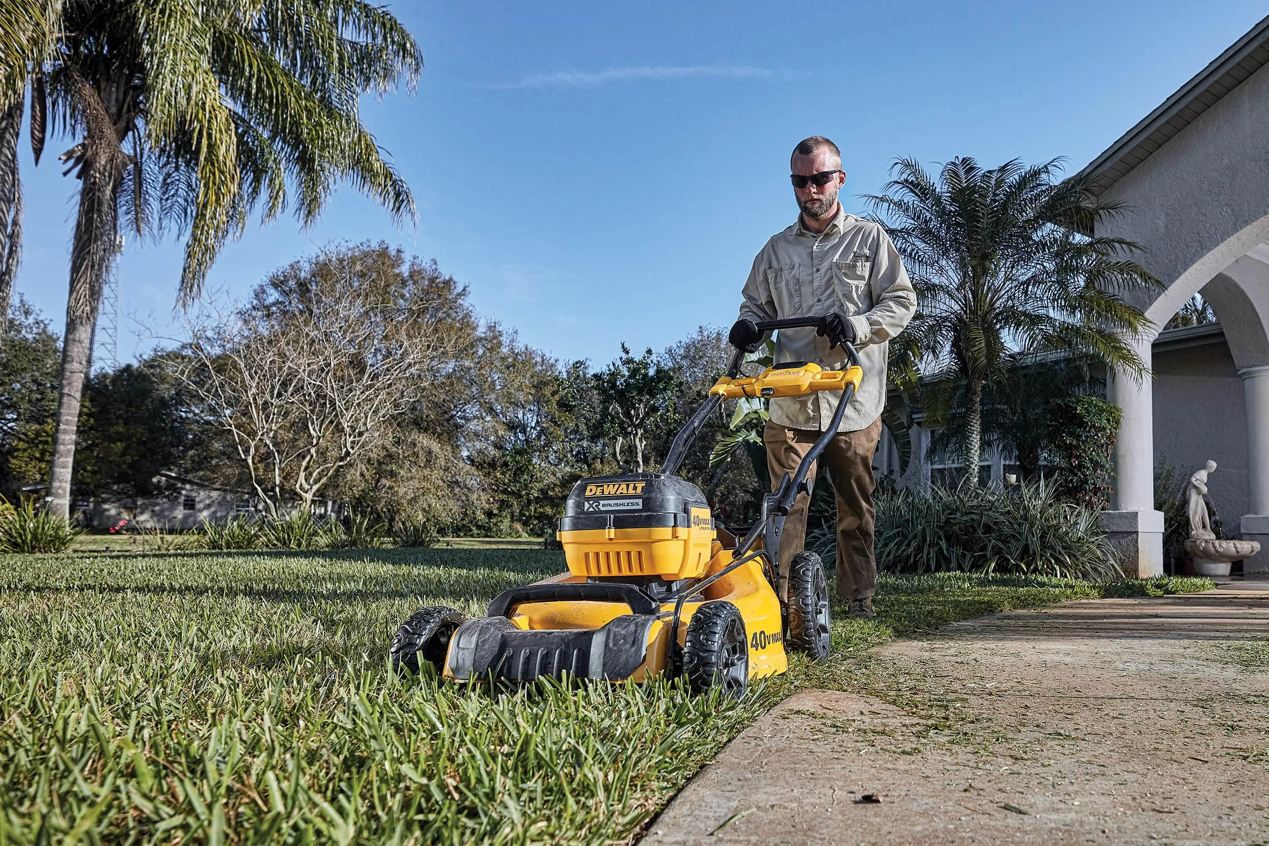 cordless-mower-mowing-along-sidewalk-02.jpg