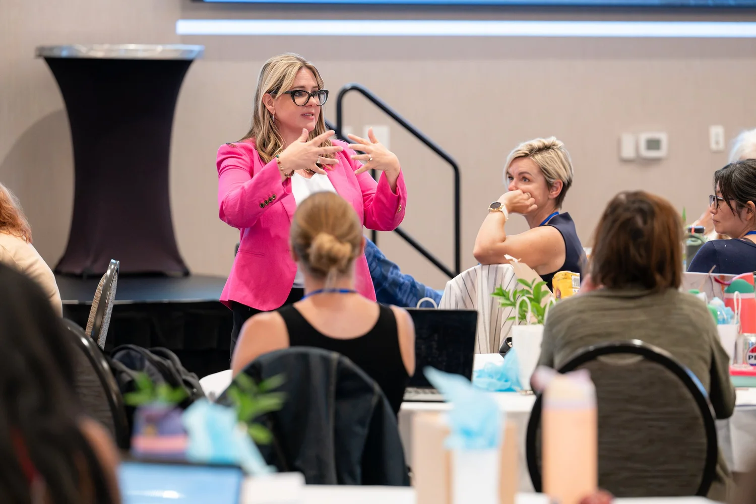 Tera presenting to a group of professionals