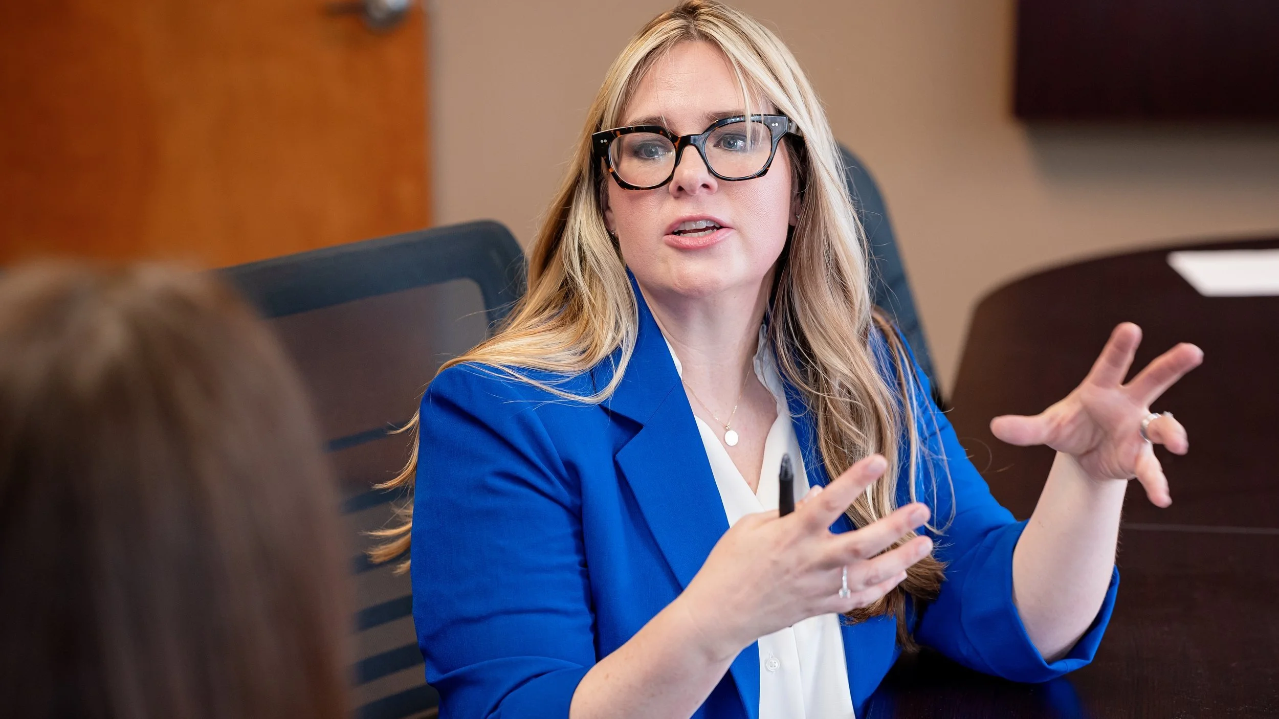Tera Sumpter explaining a concept during a discussion.