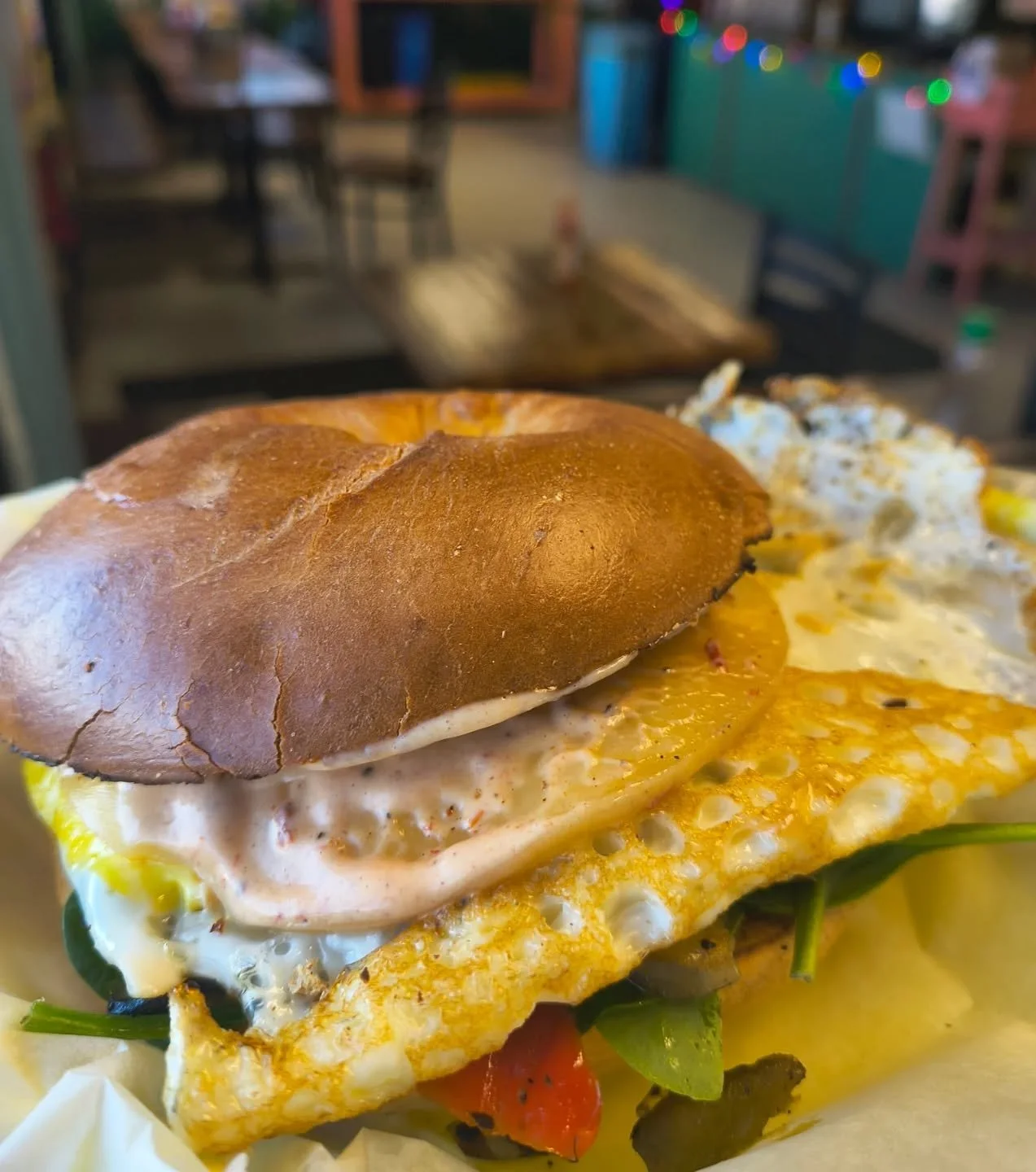 👌New special 👌
Fried egg, peppers and onions, spinach, Gouda and chipotle sauce on a jalapeno cheddar bagel 

#207 #maineeats