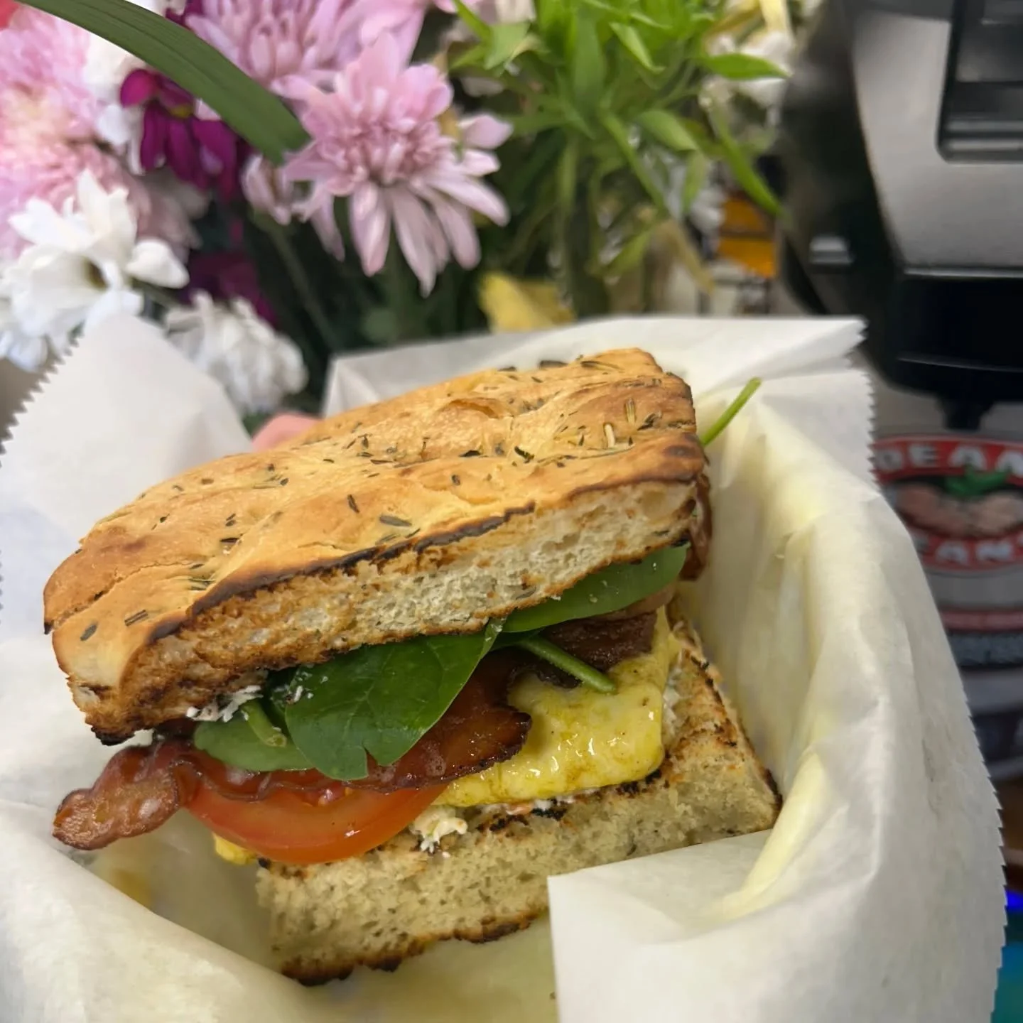 Special🌈
Bacon, scrambled egg filled with cheddar cheese, spinach, grilled red onion, tomato and veggie cream cheese on focaccia &hearts;️

#207 #maineeats