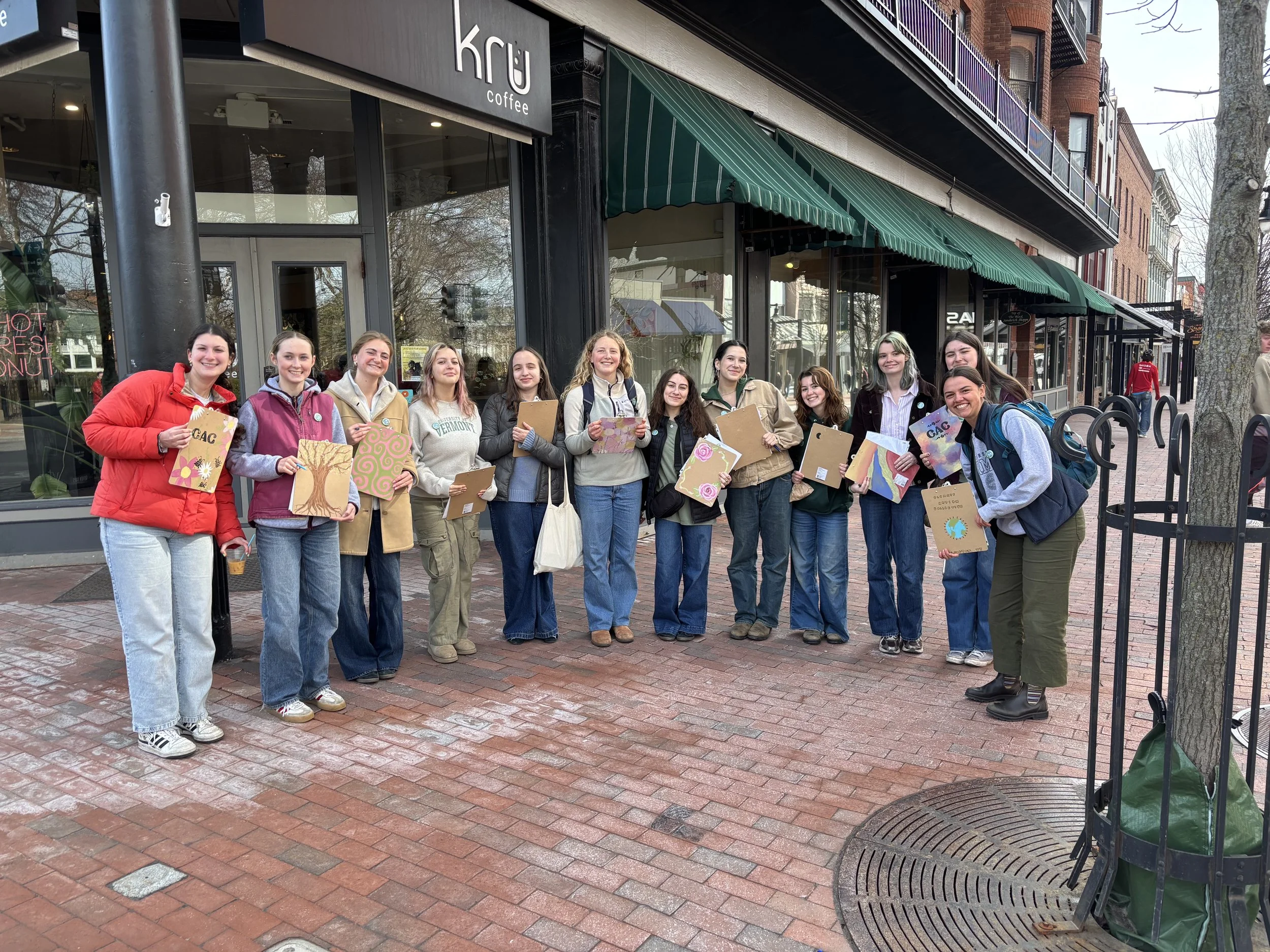 CAC Students gathered on Church St with clipboards to canvass.