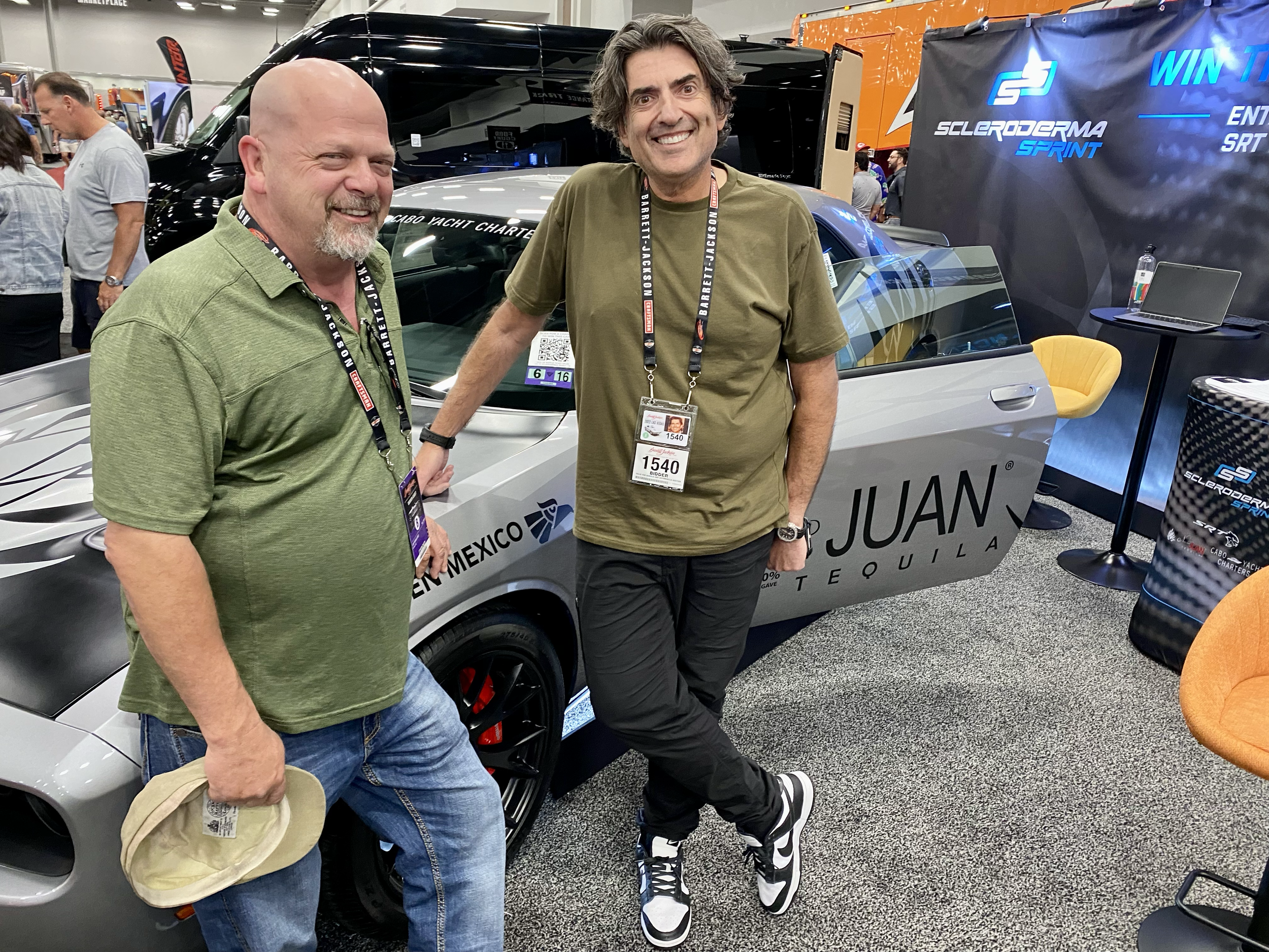 Saville Kellner (CEO of Vegas-based marketing firm, Revenue Media Group) and friend next to new Hellcat to be auctioned at Las Vegas marketing event (Scleroderma Sprint)