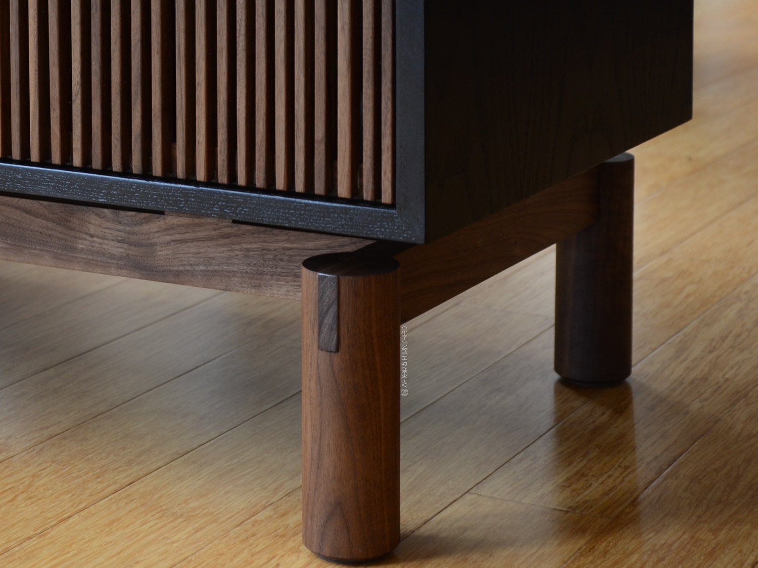 Stylish and functional vinyl storage cabinet with slatted walnut doors, tenon joinery base, and ebonized oak frame.