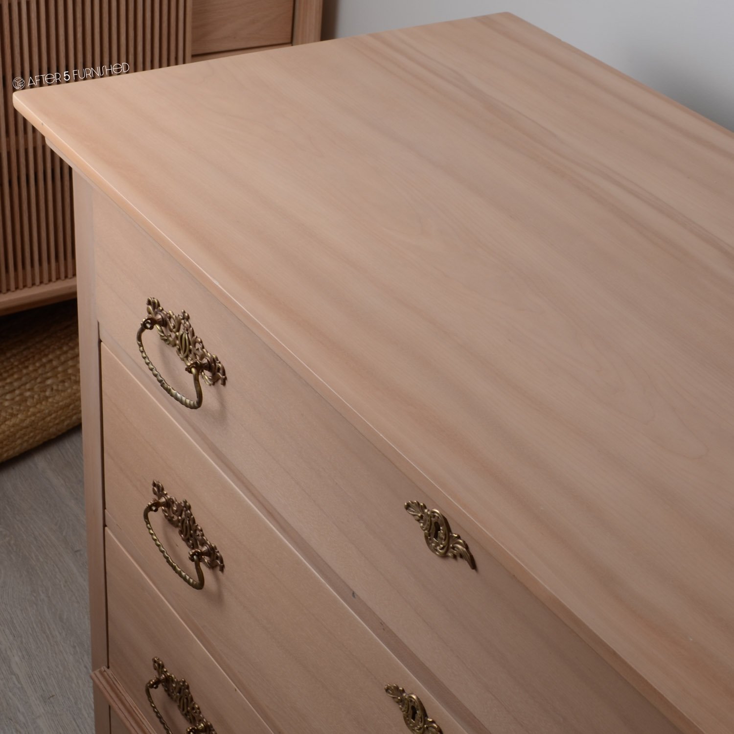 Top view of refinished maple dresser showing natural wood grain