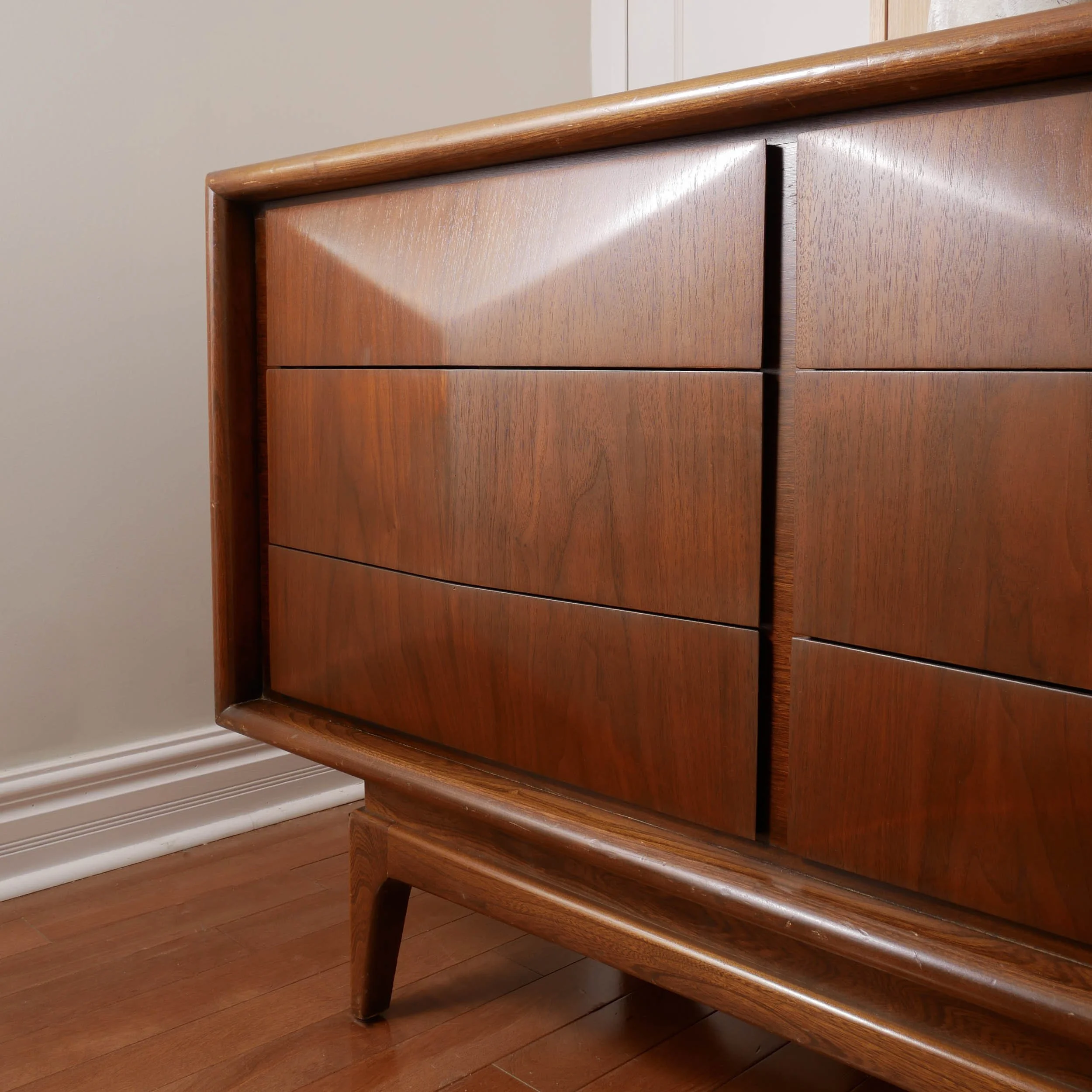 Refinished MCM walnut lowboy dresser with geometric diamond drawer fronts, locally made Toronto furniture, luxury vintage piece