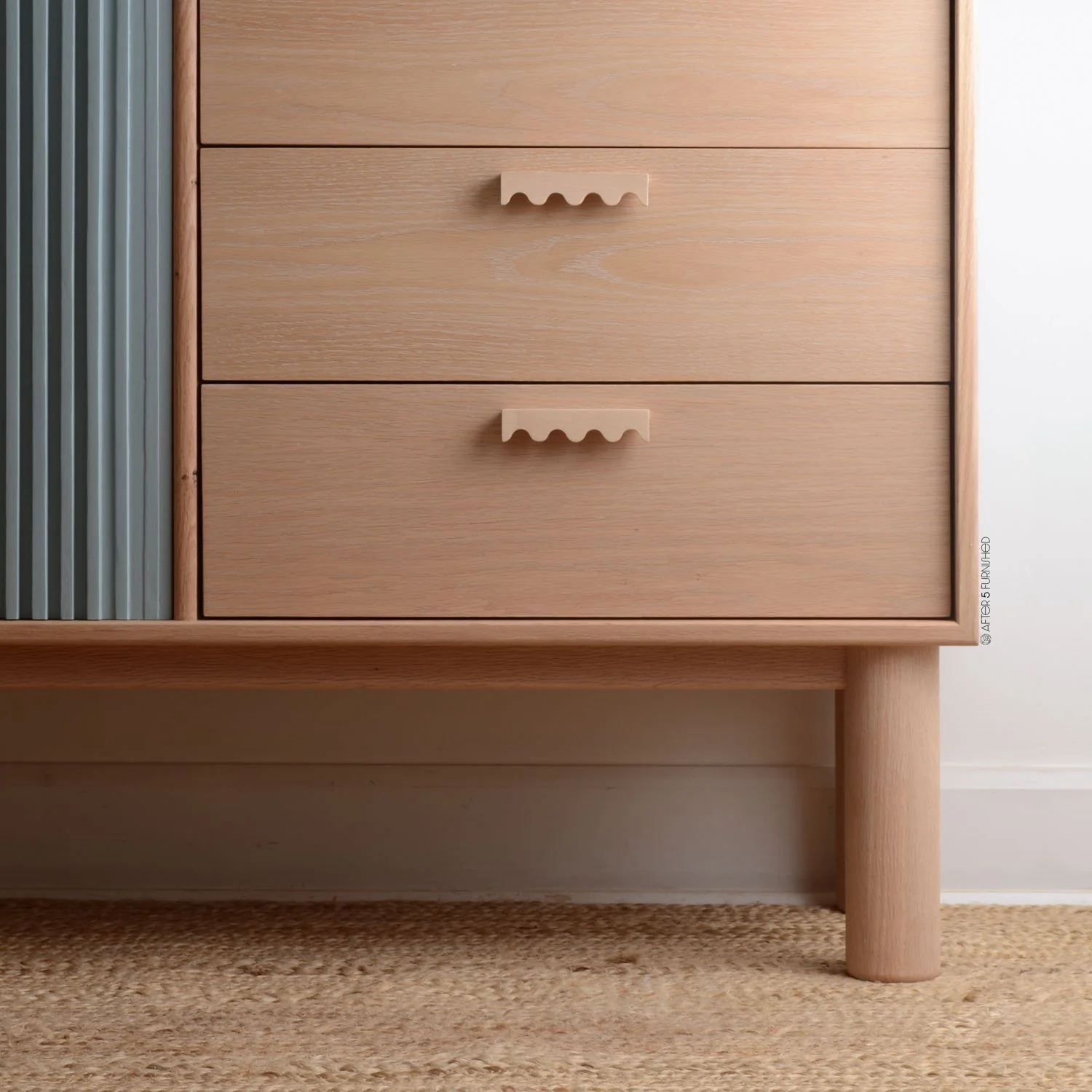 Blue dresser with solid oak frame and chunky round legs