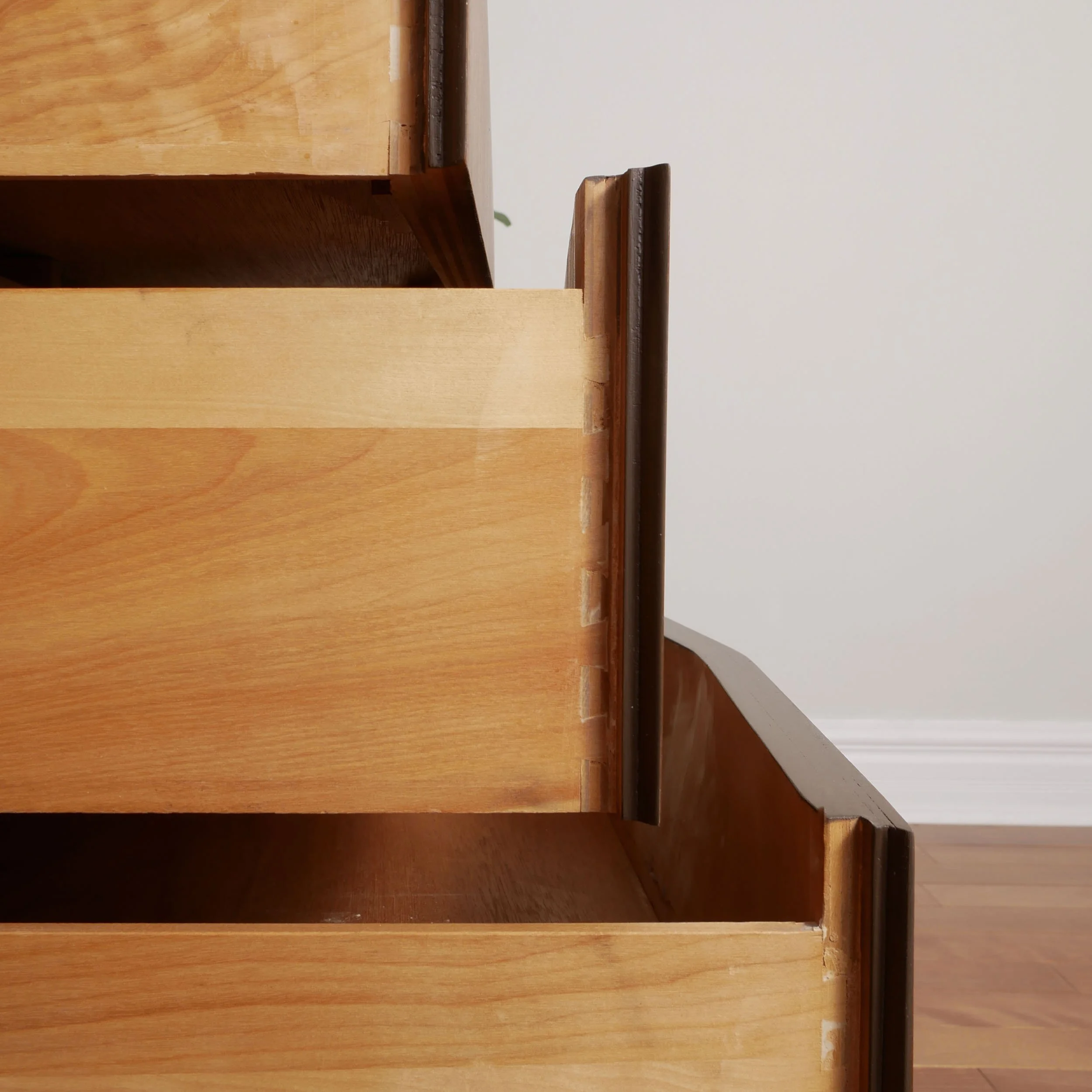 Mid century modern walnut low dresser with geometric drawer fronts, locally restored Toronto furniture, luxury bedroom storage