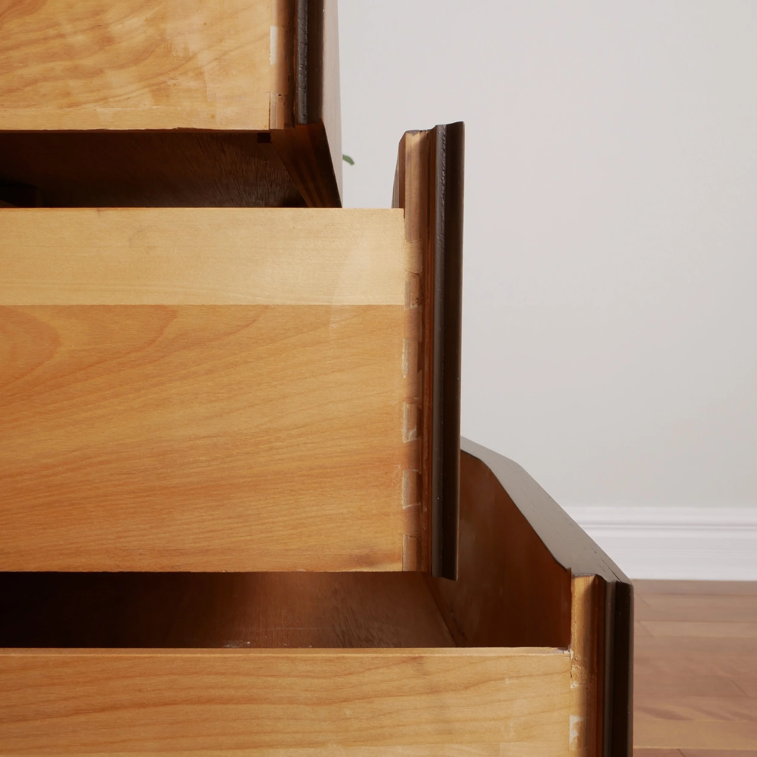 Sculptural mid century modern dresser in walnut veneer with architectural diamond motif
