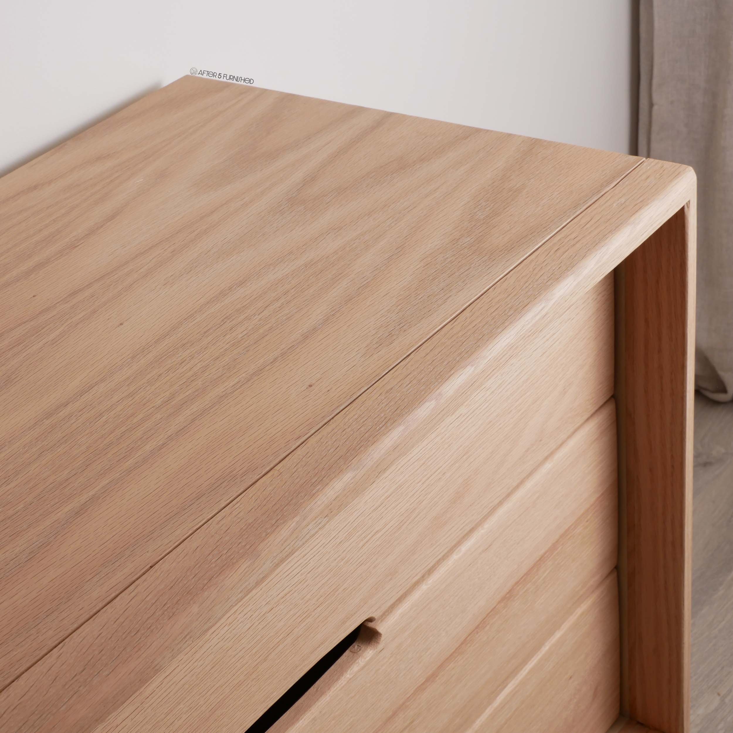 Scandinavian modern oak media console with sliding slatted doors and drawers, handcrafted solid wood furniture Toronto studio