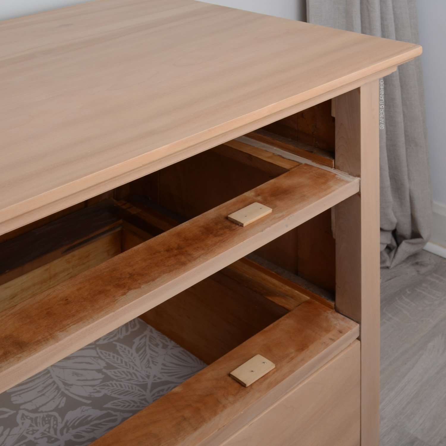 Large refinished dresser with original hardware and natural finish