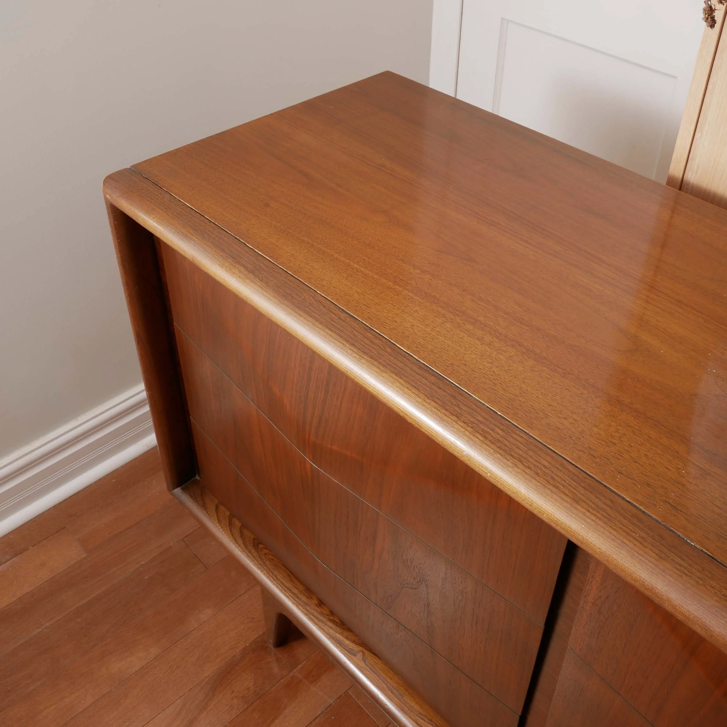 High-end mid century walnut dresser with sculptural diamond front detail, refinished Toronto furniture for modern interiors