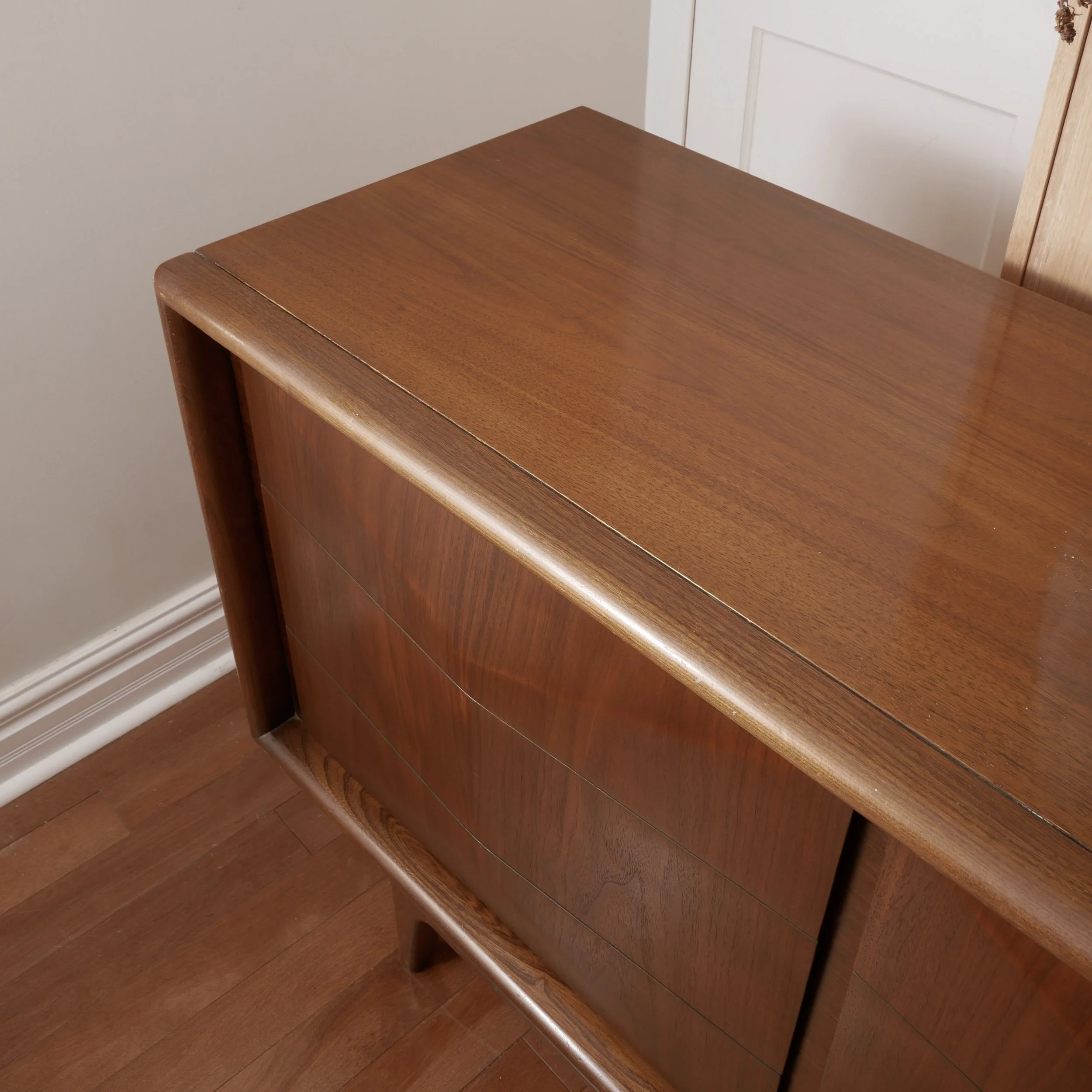 Large vintage walnut lowboy dresser with nine drawers and restored mid century craftsmanship
