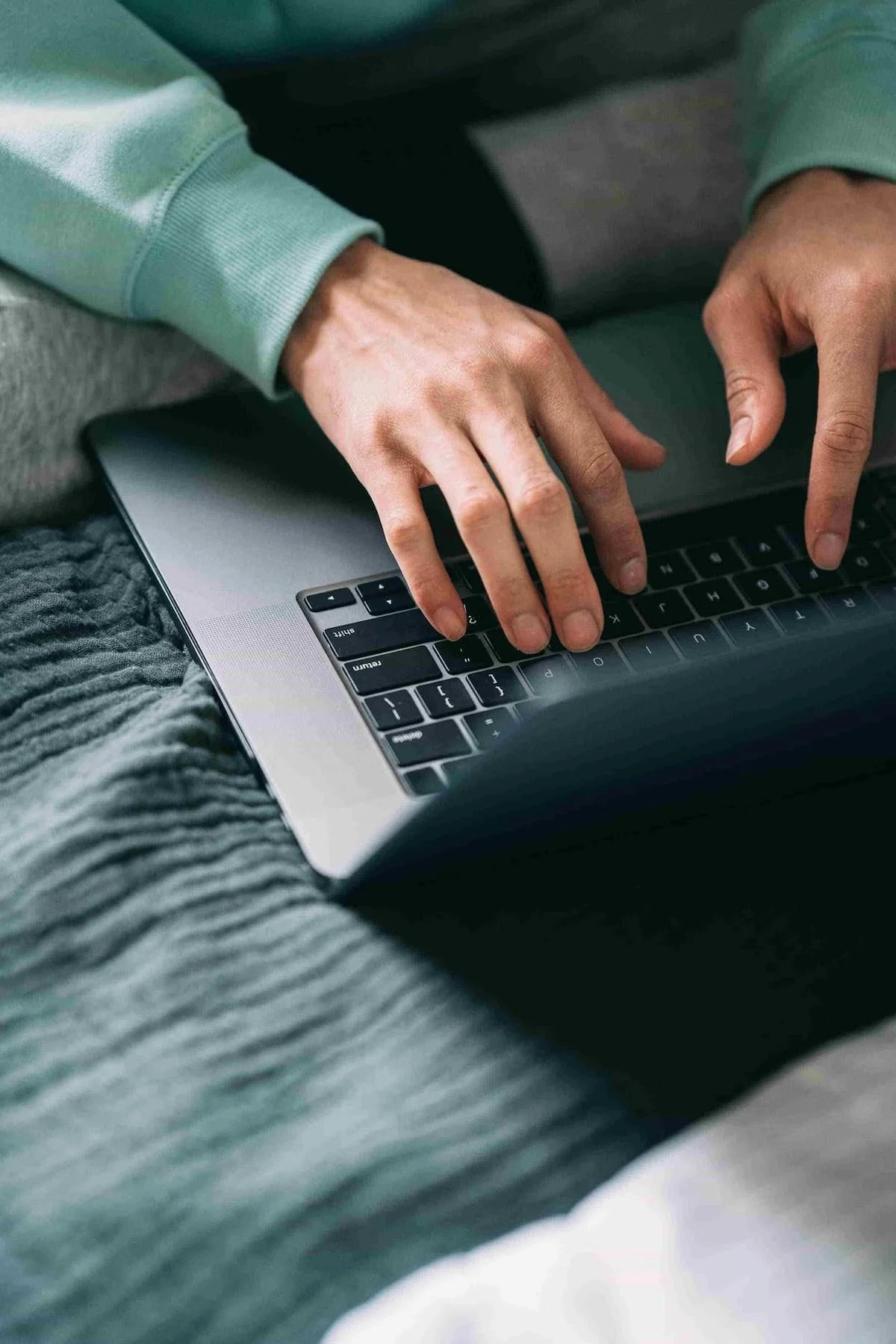 Man typing on computer
