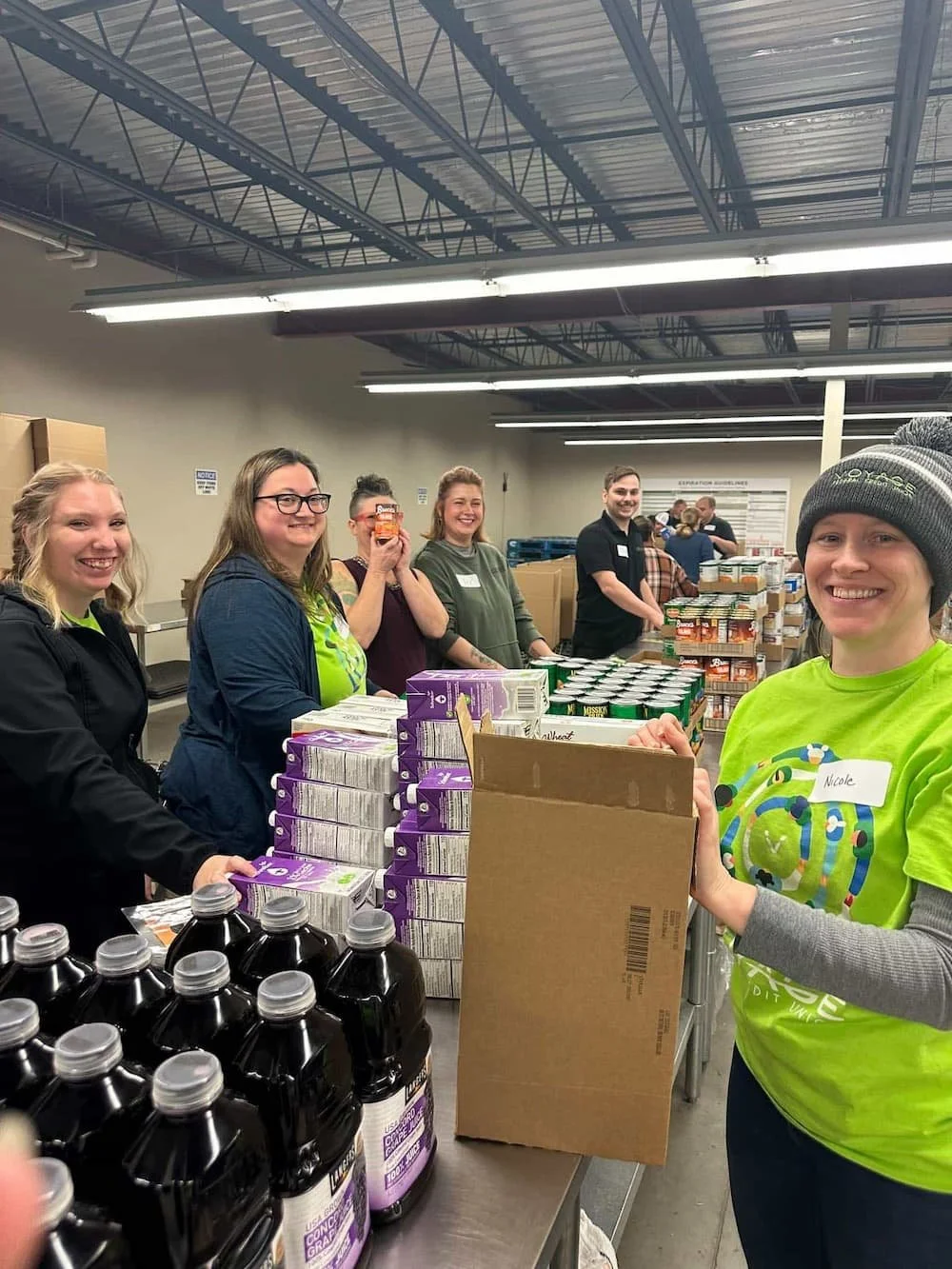Voyage team members managing food for Feeding South Dakota in SIoux Falls, SD.