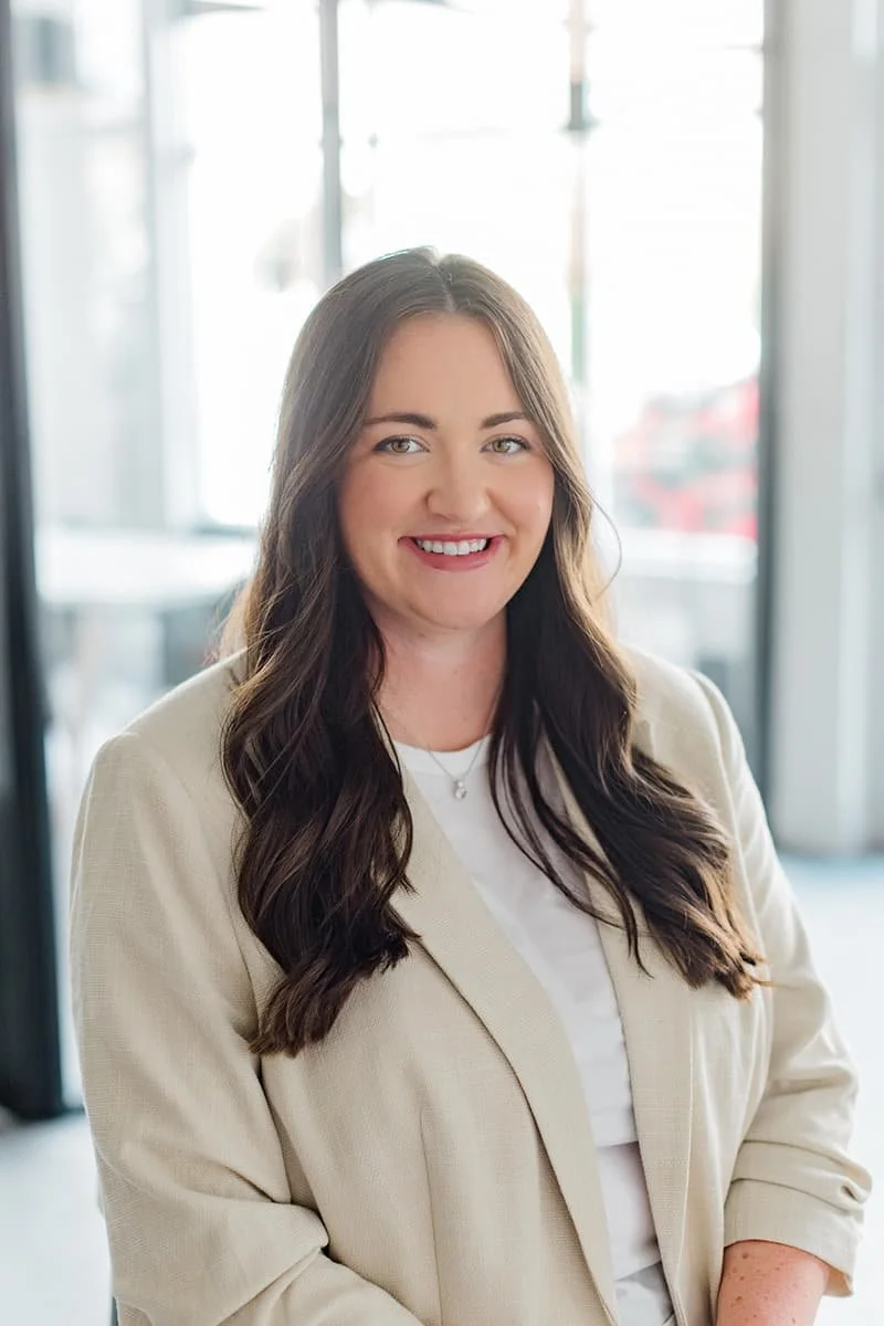 Samantha Jaton smiling for a headshot.