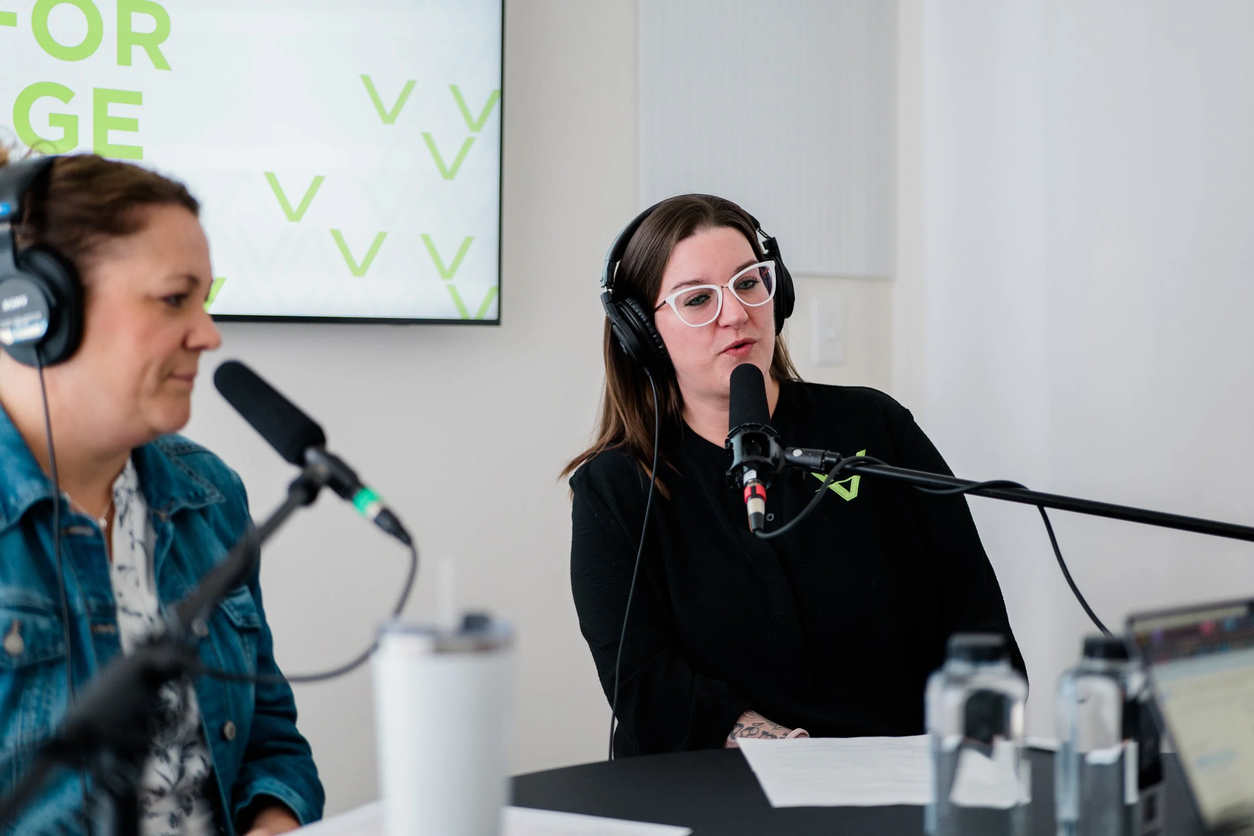2 woman in a podcast studio