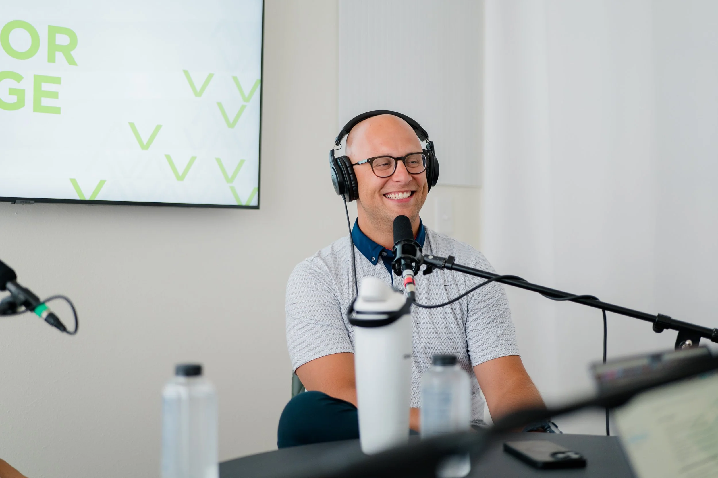 Isaac in podcast studio