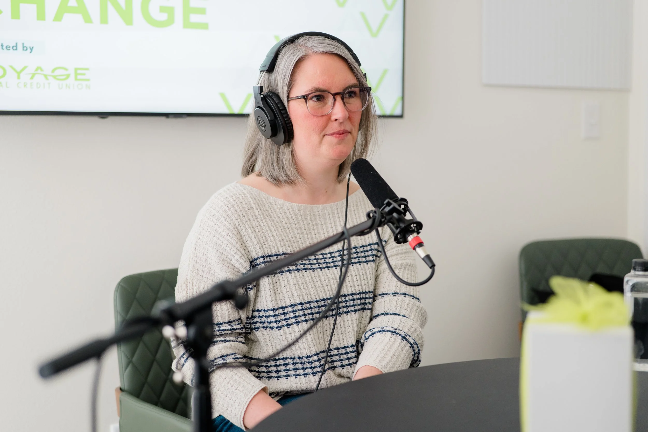 Suzanne Warwick behind microphone